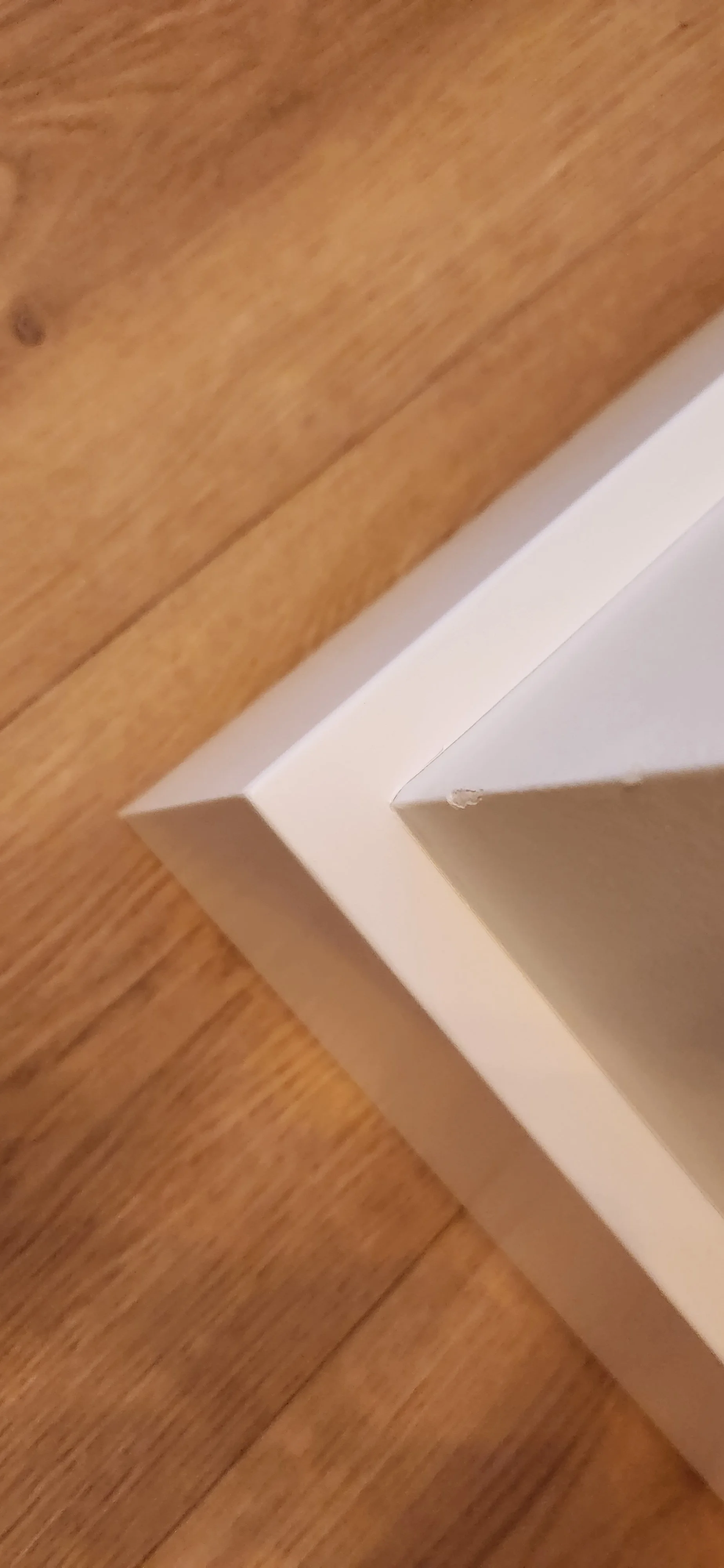 Close-up of an immaculate base trim outside corner.