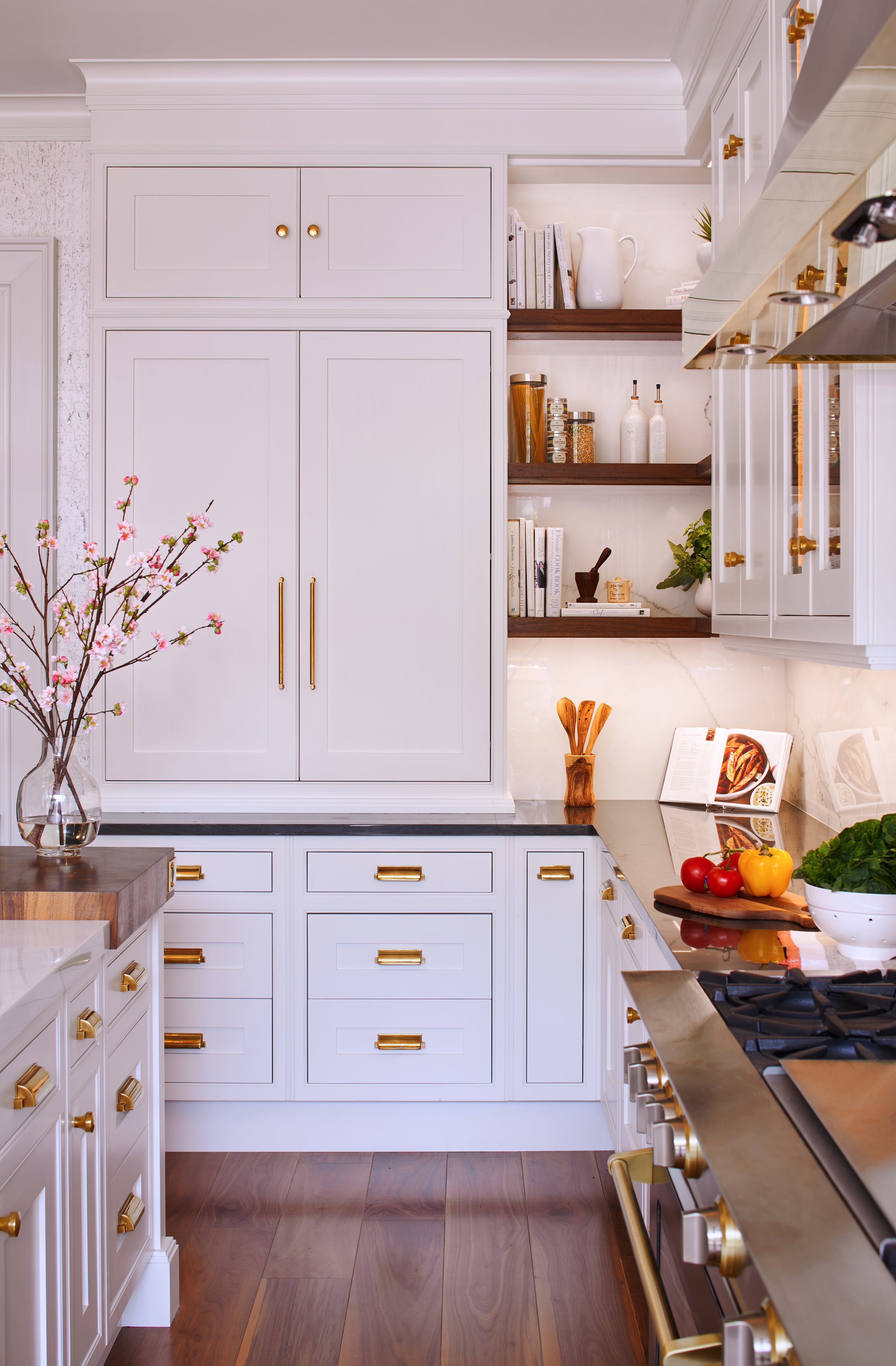 White custom kitchen cabinetry with brass hardware, from our Clive Christian showroom in Tenafly, NJ.
