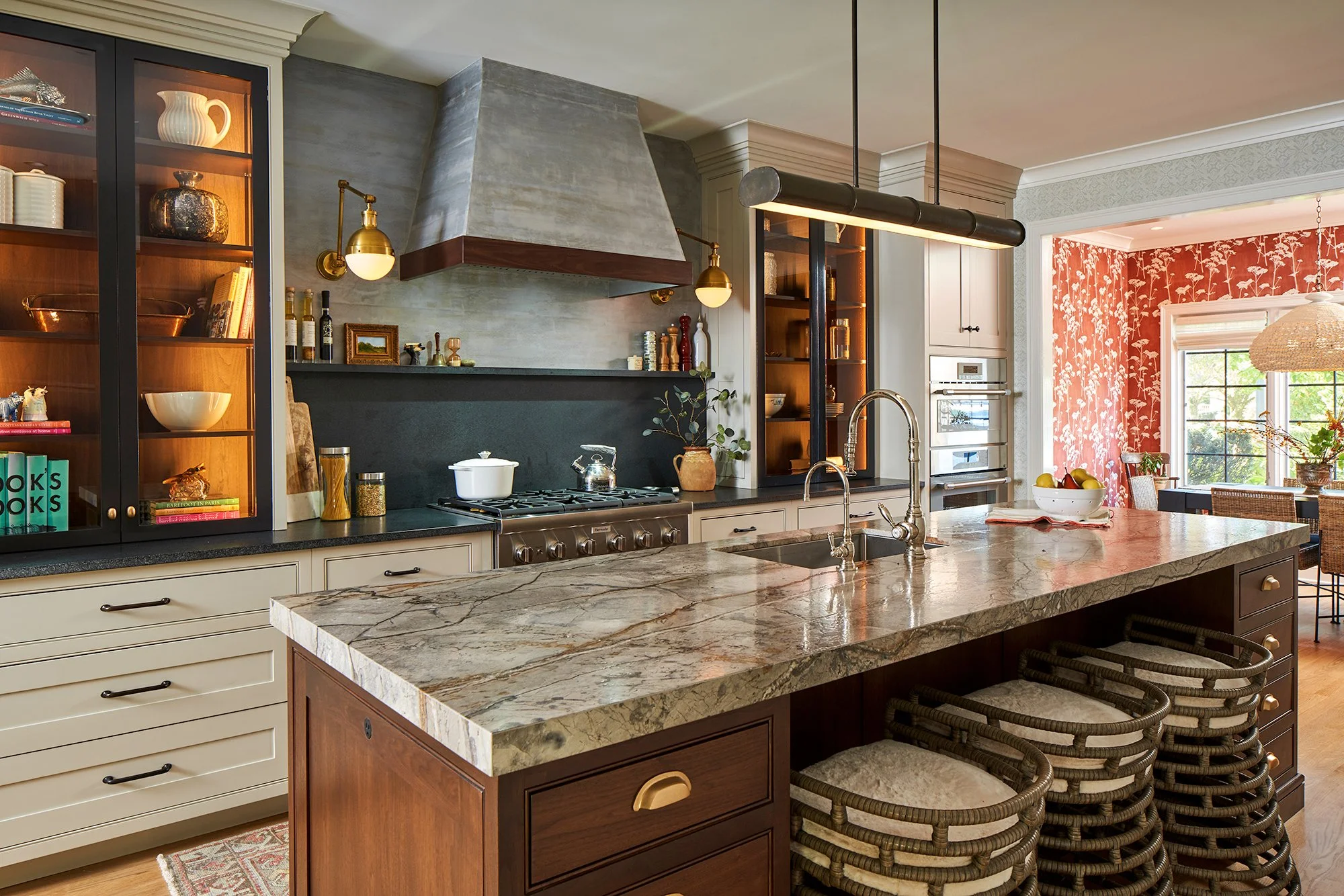 Kitchen with glass-front cabinetry, quartzite island, and brass fixtures — a New Jersey Luxury Kitchens project in Park Ridge, NJ.