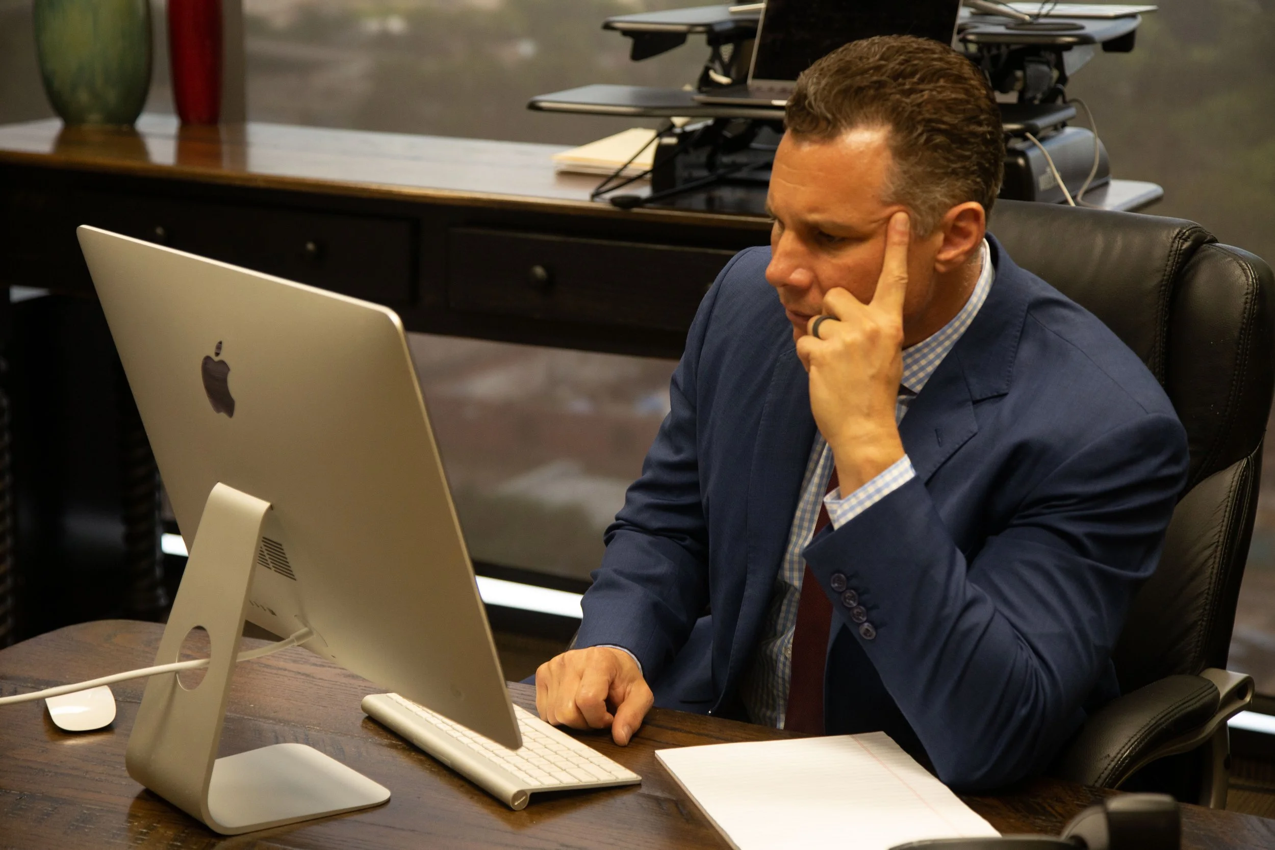 Carlo D'Angelo East Texas criminal defense attorney reviewing case files