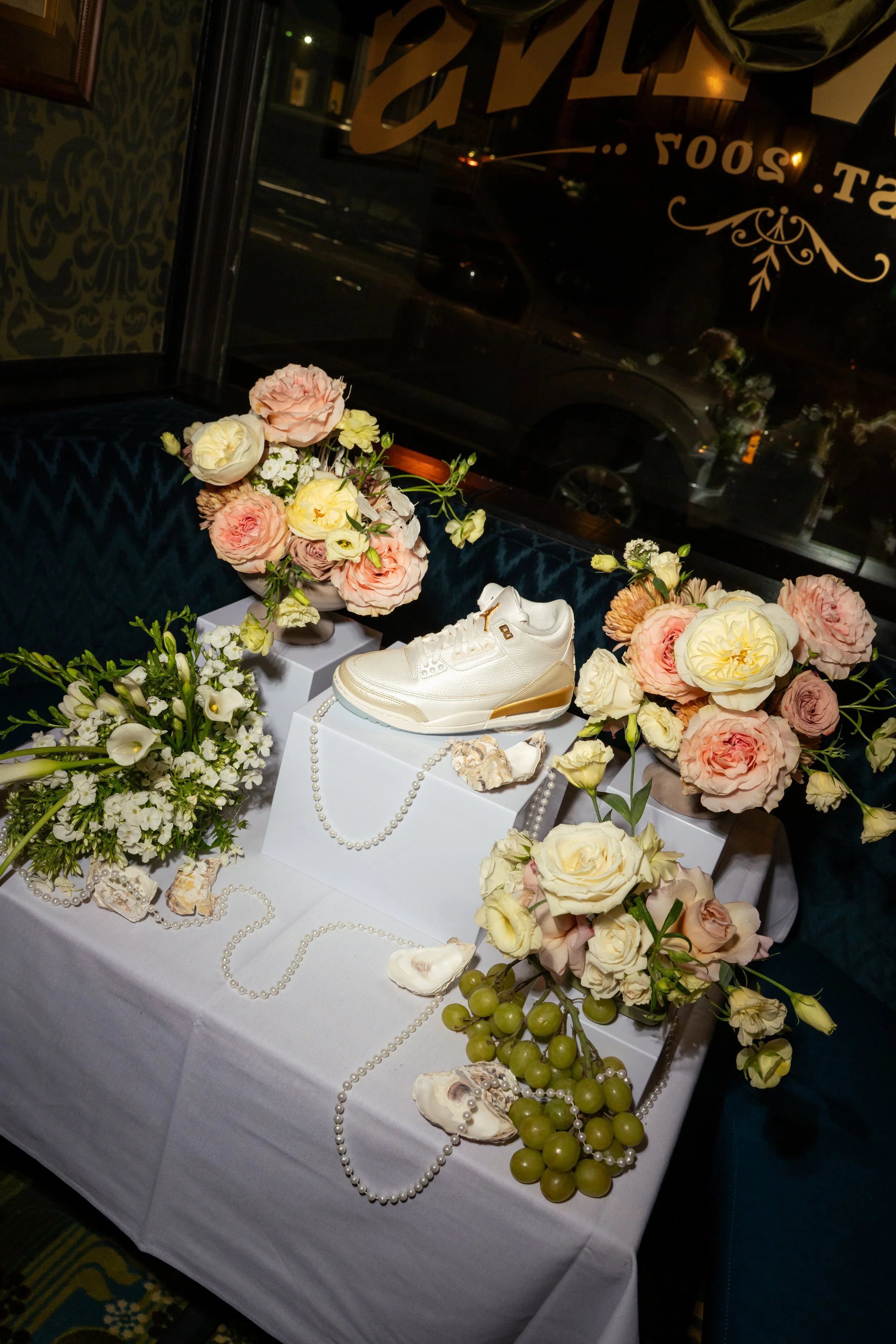 Oyster and Champagne Jordans with Kicks Lounge