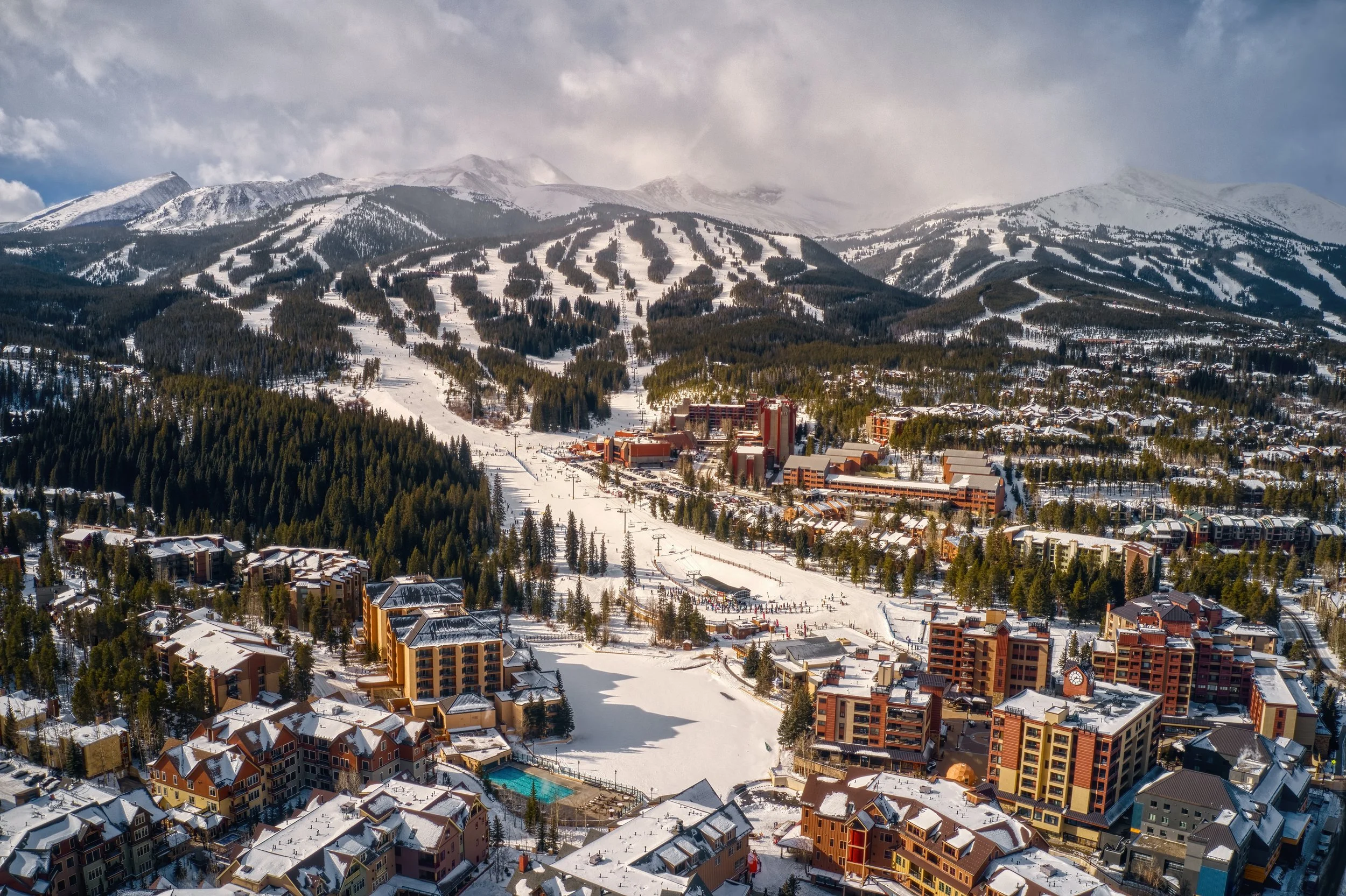 The town of Breckenridge, Colorado, with views of the mountain ski trails in the background