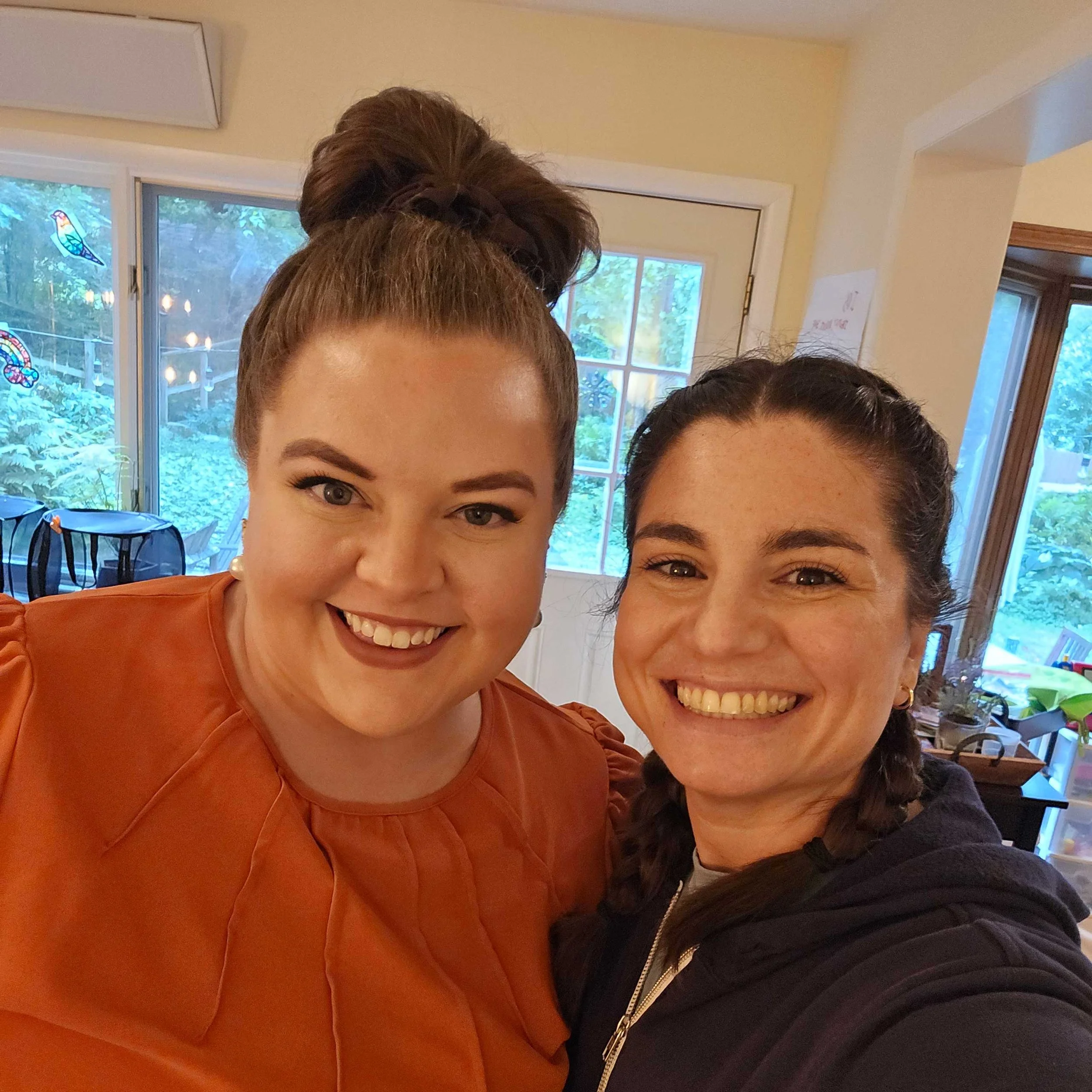 Two women smiling
