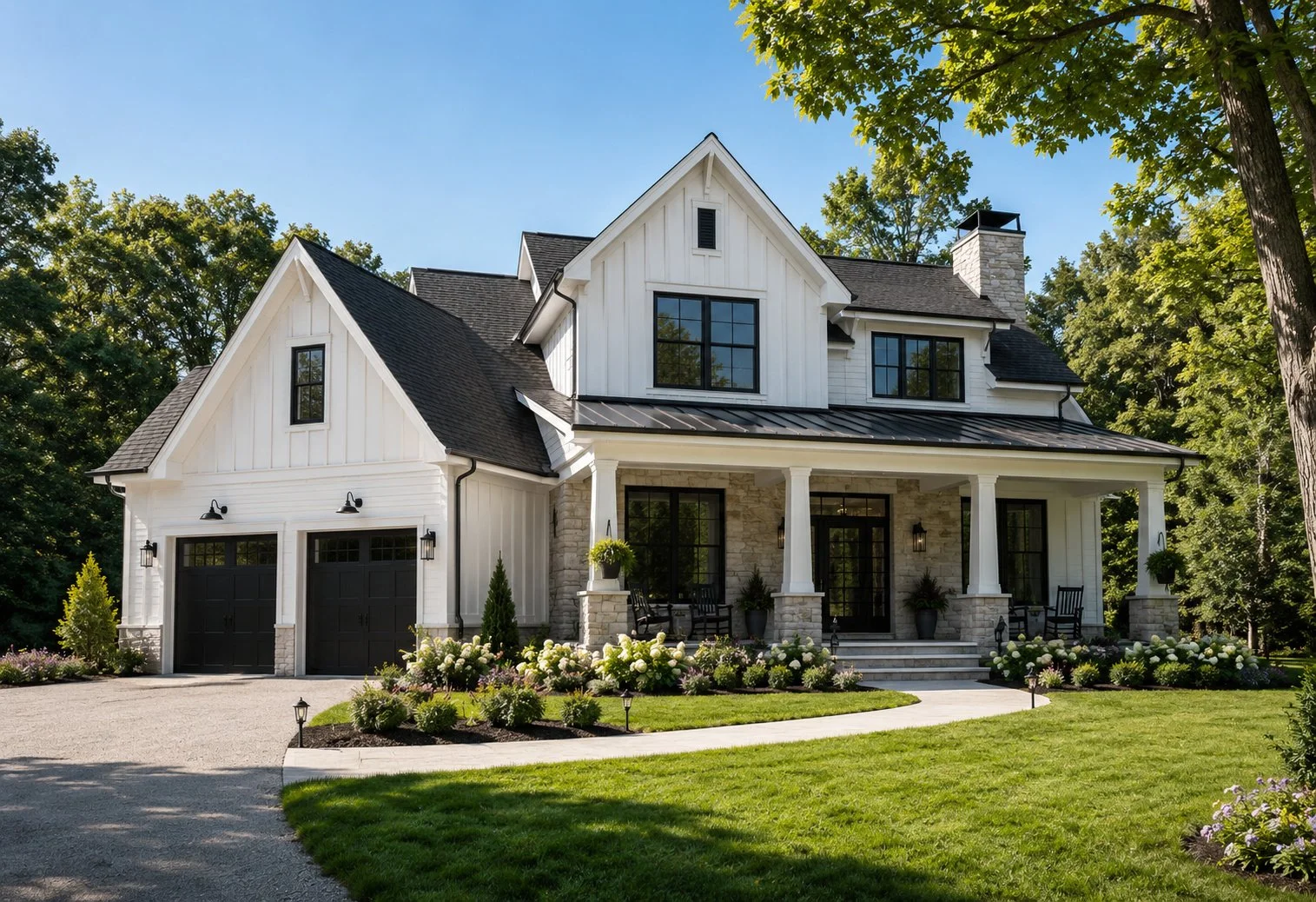 modern new england farmhouse with white  board and battenin siding black trim and stone front porch north western rhode island designed by resilient design build