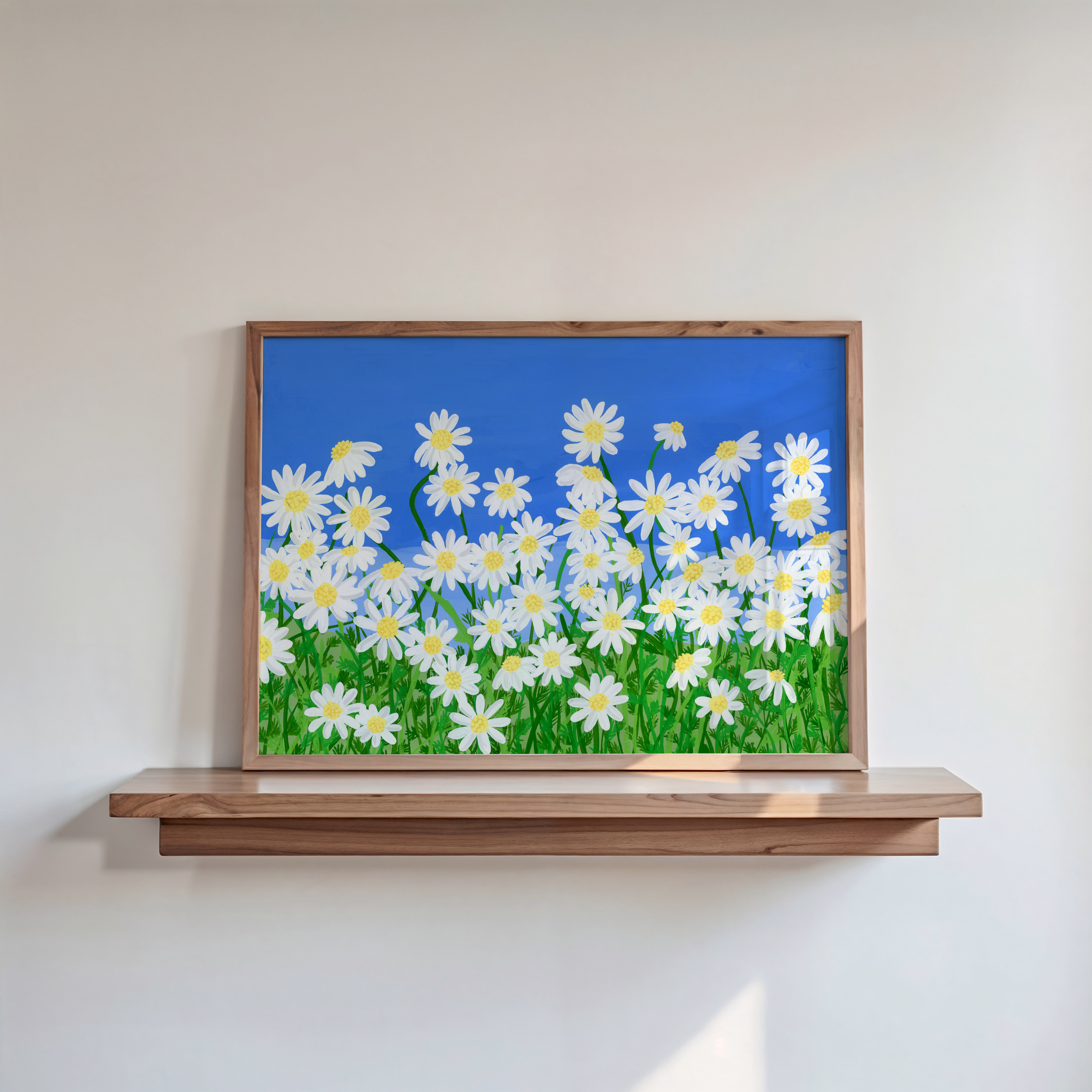 Summer daisy art print in a frame on a shelf