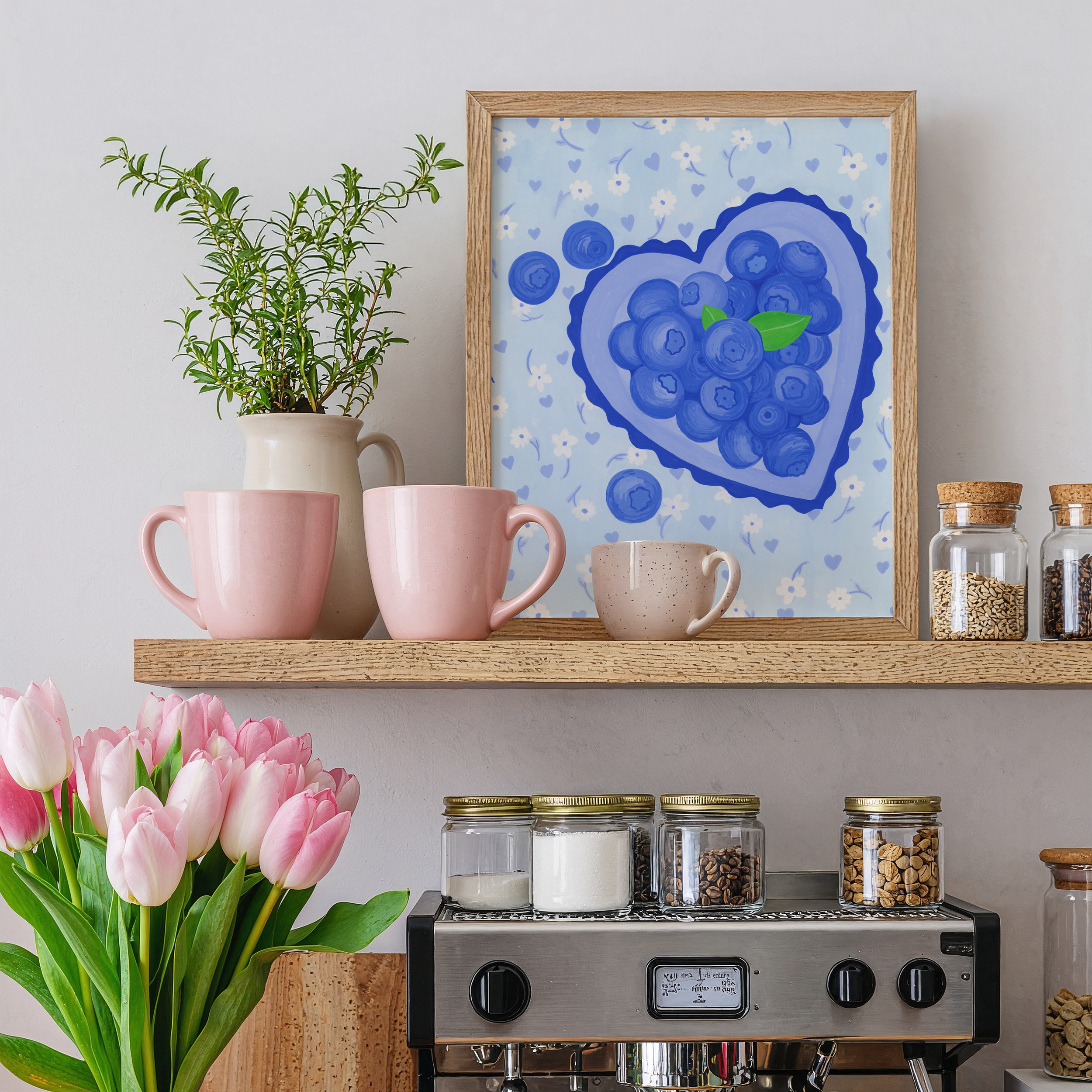 A painting of blueberries framed in a kitchen
