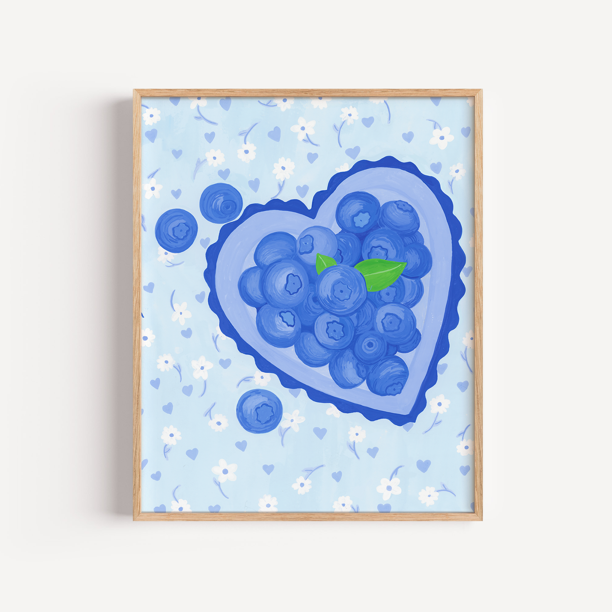 A painting of a heart shaped bowl of blueberries in a simple wooden frame