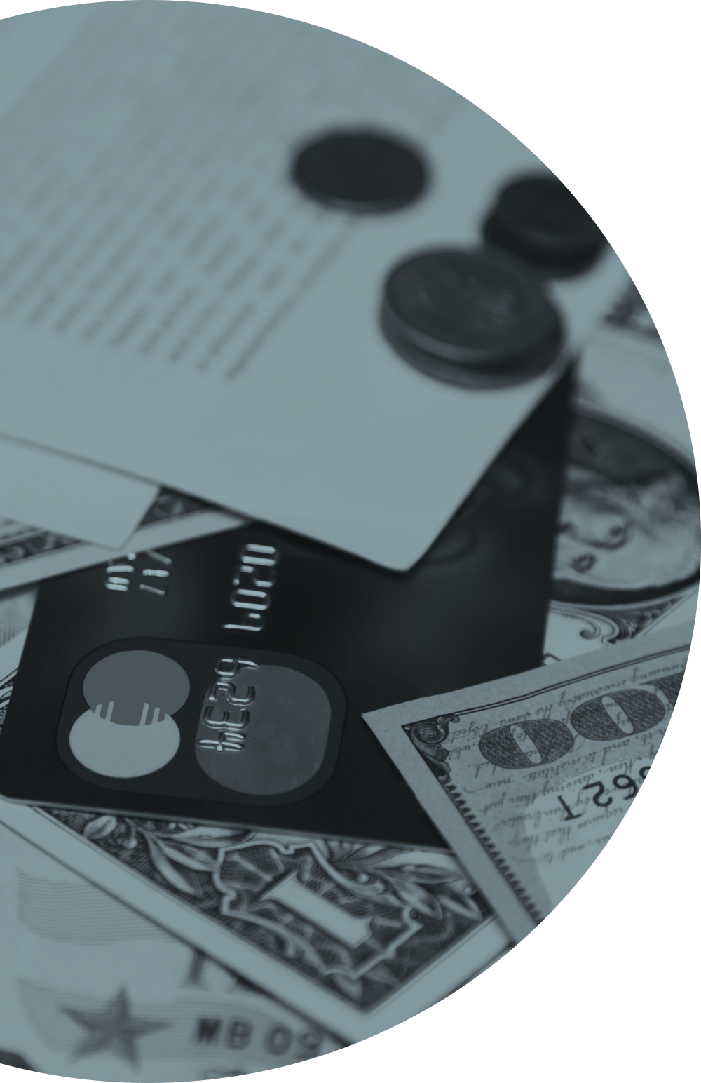 Close-up of a credit card, paper bills, coins, and a receipt on a flat surface, representing money and financial transactions.