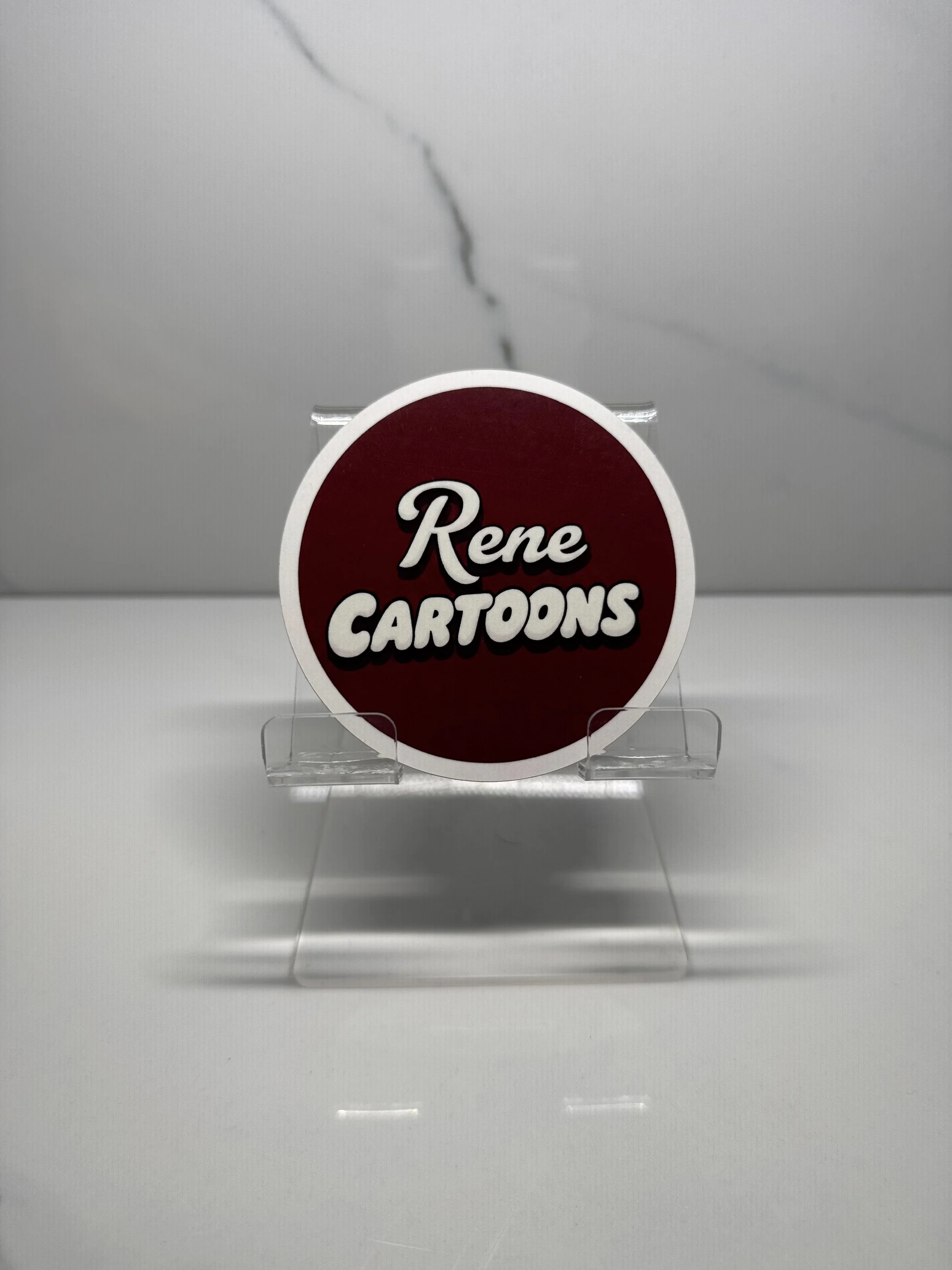 Rene Cartoons Sticker (The Brand)