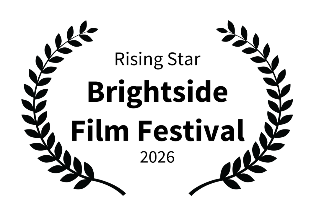 An award emblem with a laurel wreath border and the words "Certificate of Excellence" in the center.