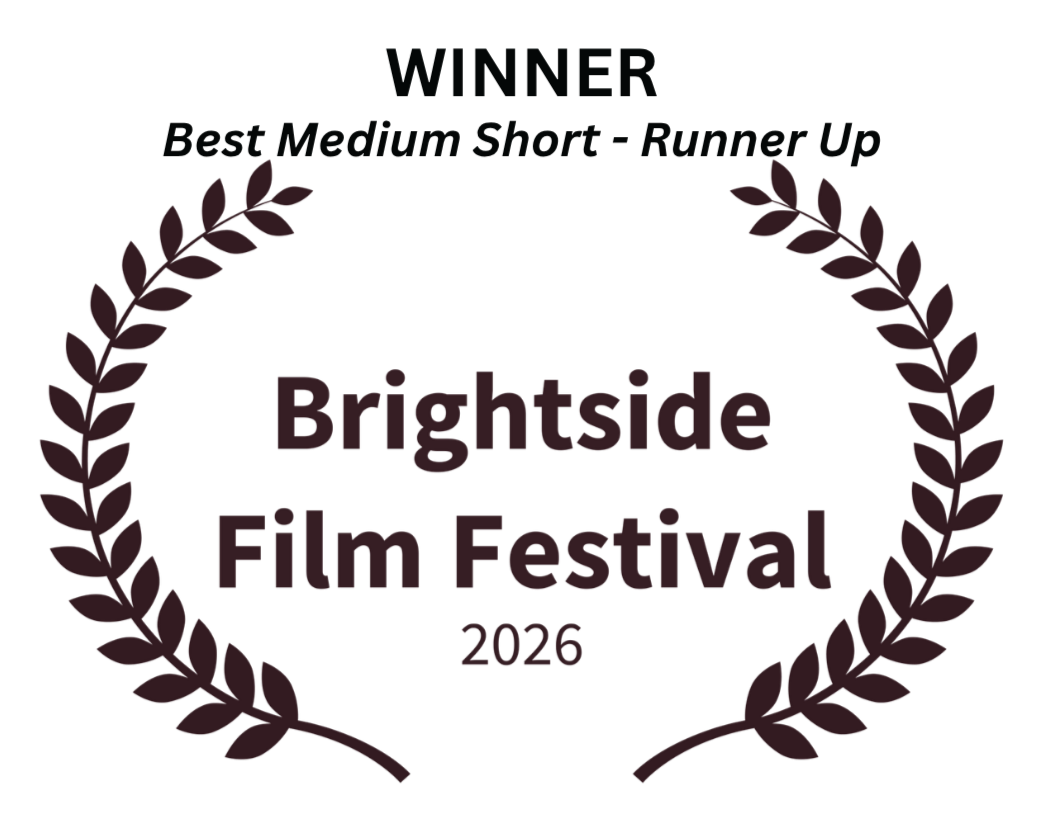 Brightside Film Festival 2026 award badge recognizing The Quiet Between as Winner and Runner-Up for Best Medium Short, with laurel leaves.