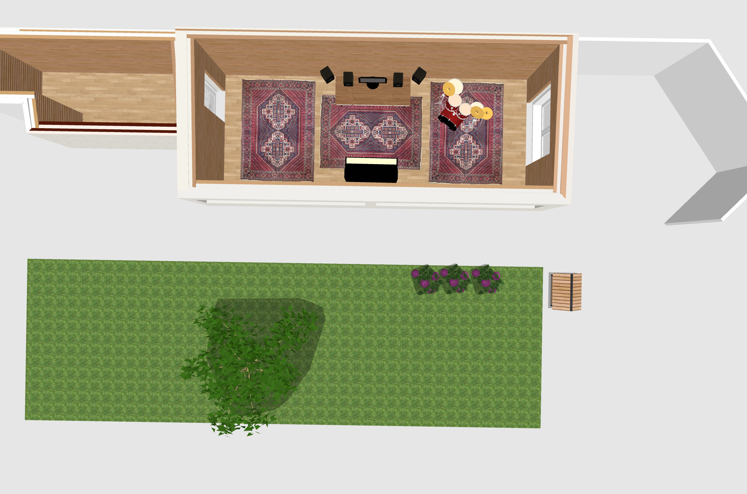 Top-down view of a house interior with a music room featuring rugs, a drum set, speakers, and a TV, connected to a backyard with grass, bushes, and a pathway.