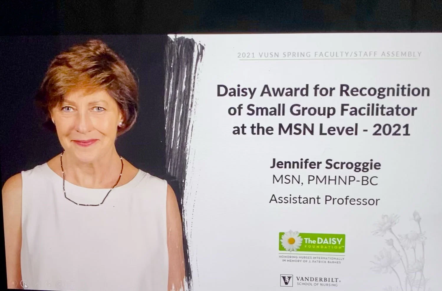 Award for Jennifer Scroggie reads Daisy Award for Recognition of Small Group Facilitator at the MSN Level - 2021. Jennifer Scroggie MSN, PMHNP-BC, Assistant Professor. Logo of The Daisy Foundation and Vanderbilt School of Nursing.