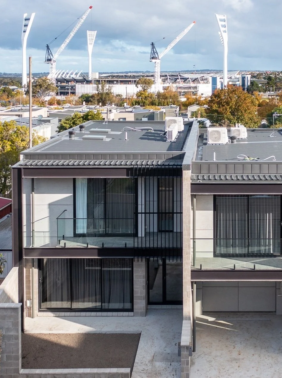 Contemporary townhome development in South Geelong with balconies, large windows and urban views, built by Geelong Building Co.