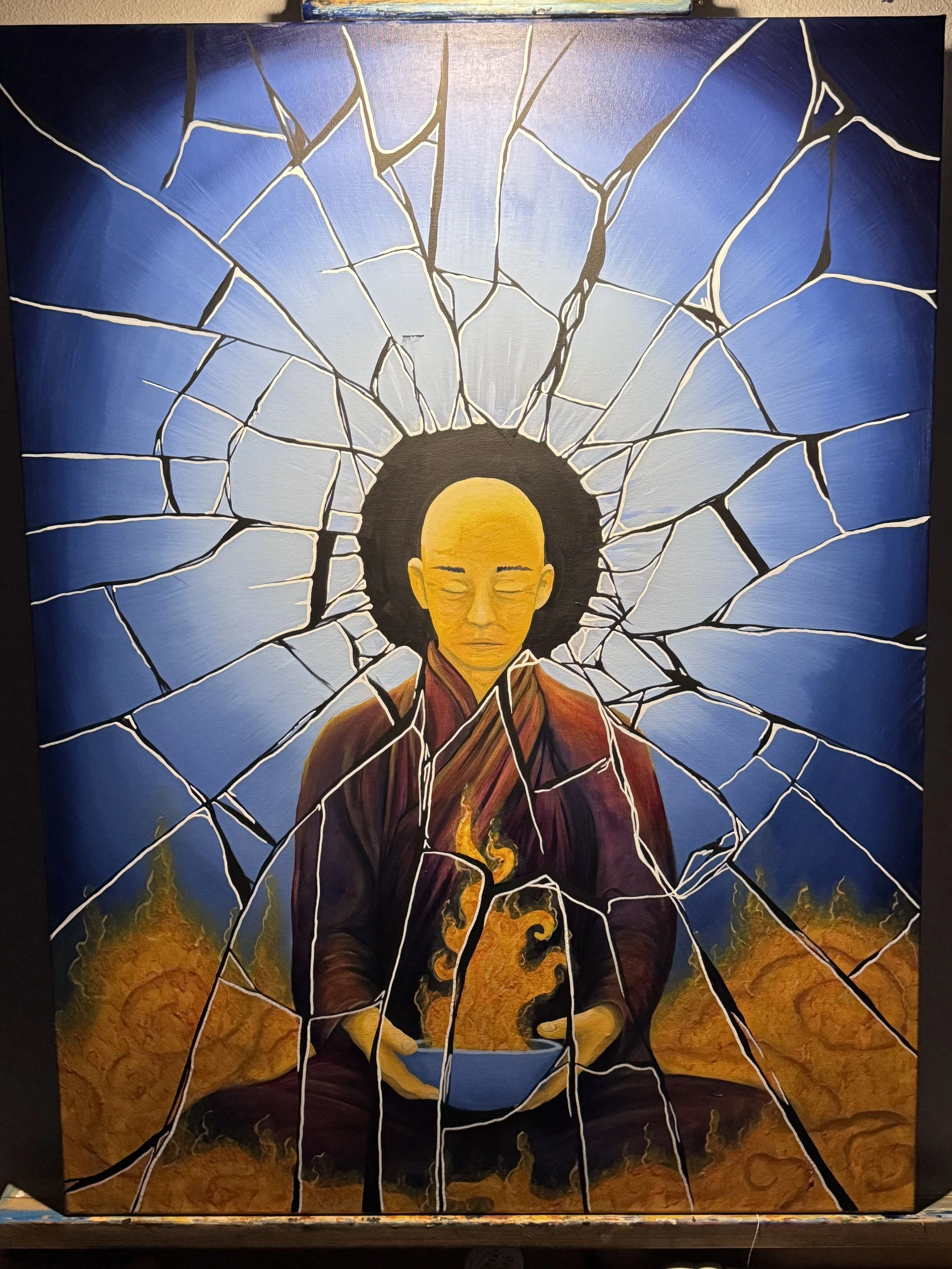 A painting of a monk with his eyes closed, holding a bowl, with a fractured mirror-like pattern radiating outward, set against a background of fiery yellow and orange hues.