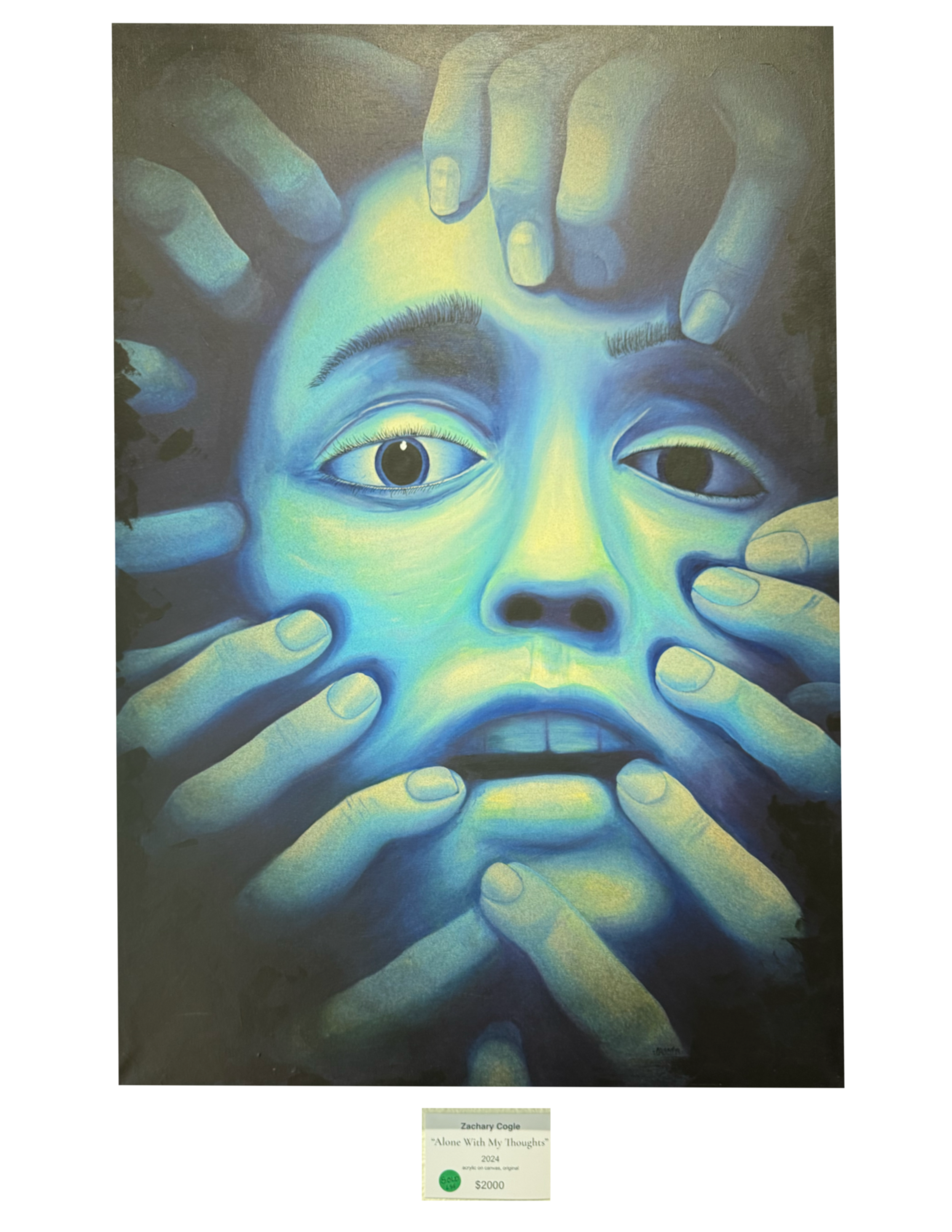 Painting titled 'Alone With My Thoughts' by Zachary Cogle, depicting a face with large eyes and hands around it, rendered in blue and yellow hues, with a price tag of $2000.