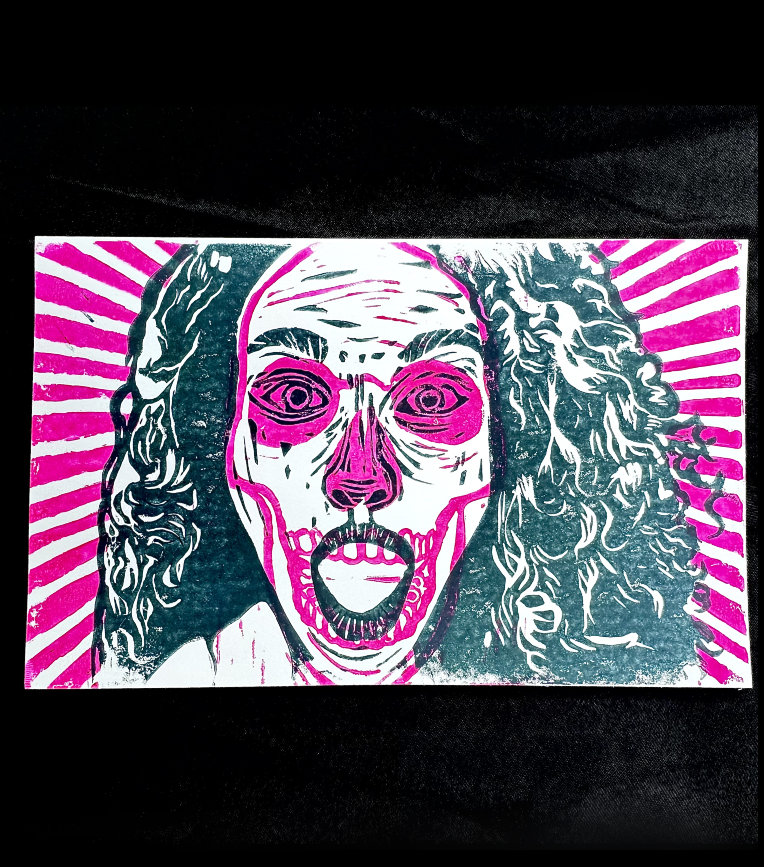 A pop art style illustration of a screaming woman with her hands on her head, colored in bold pink, black, and white with radiating pink and white stripes in the background.