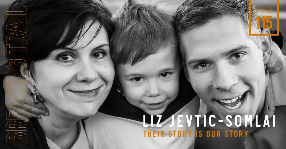 Black and white photo of a happy family, including a woman, a young boy, and a man, close together and smiling.