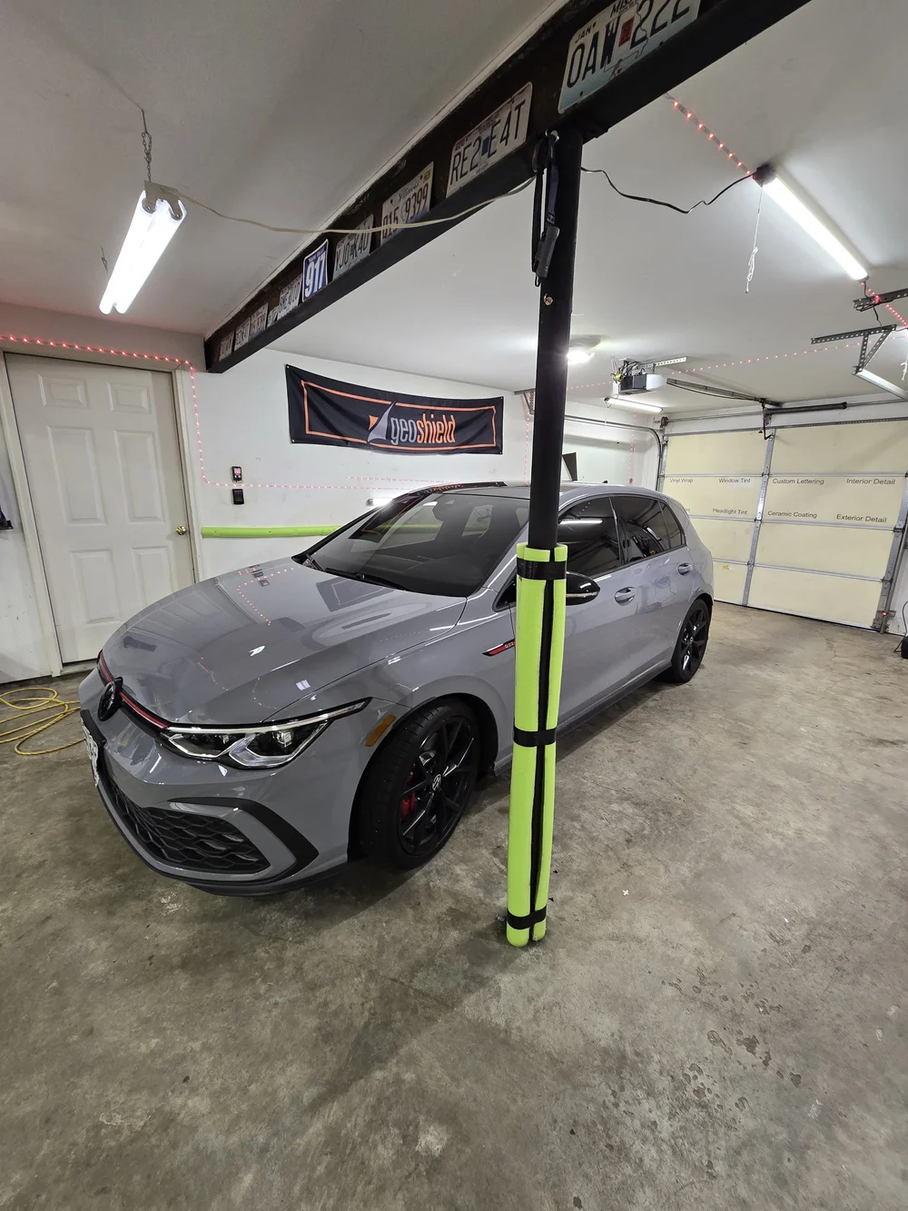 Gray vehicle inside the Talley shop