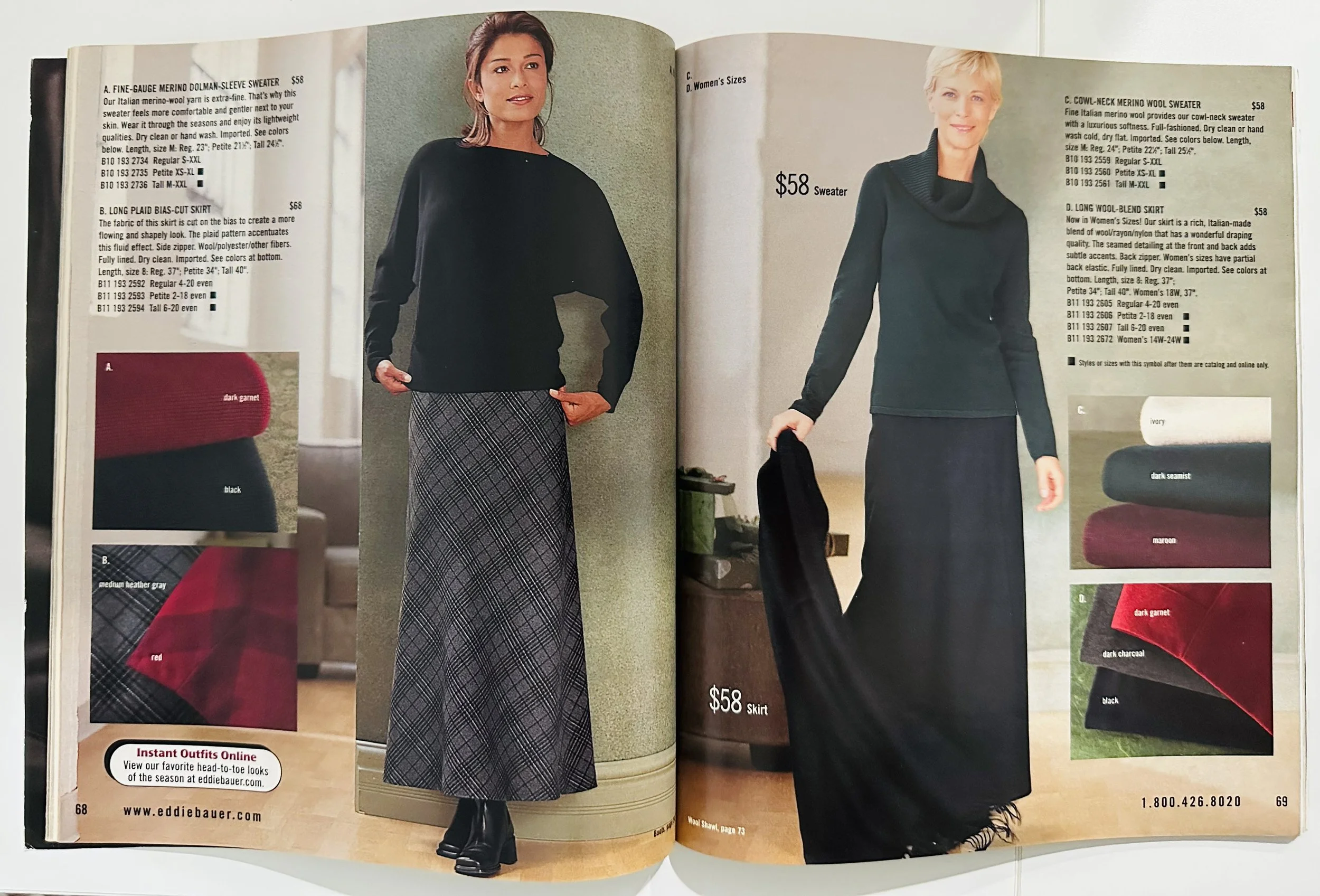 Two women modeling clothing in a store catalog. The woman on the left is wearing a black sweater and a long plaid skirt. The woman on the right is wearing a dark blue cowl-neck sweater and a long dark skirt.
