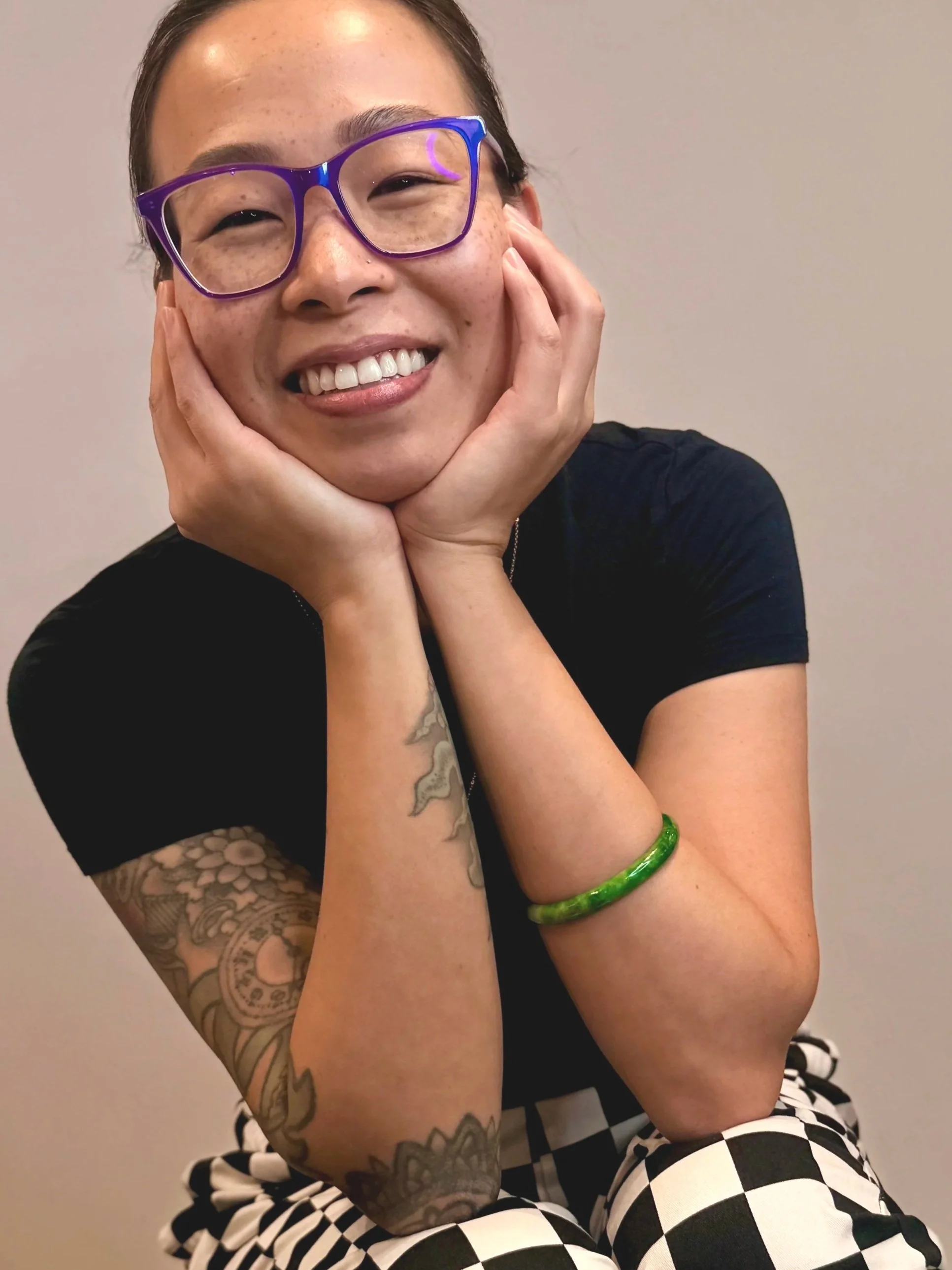 Ottawa bridal hairstylist hands on face showing up as the best version of themselves while celebrating the natural flow of change over time
