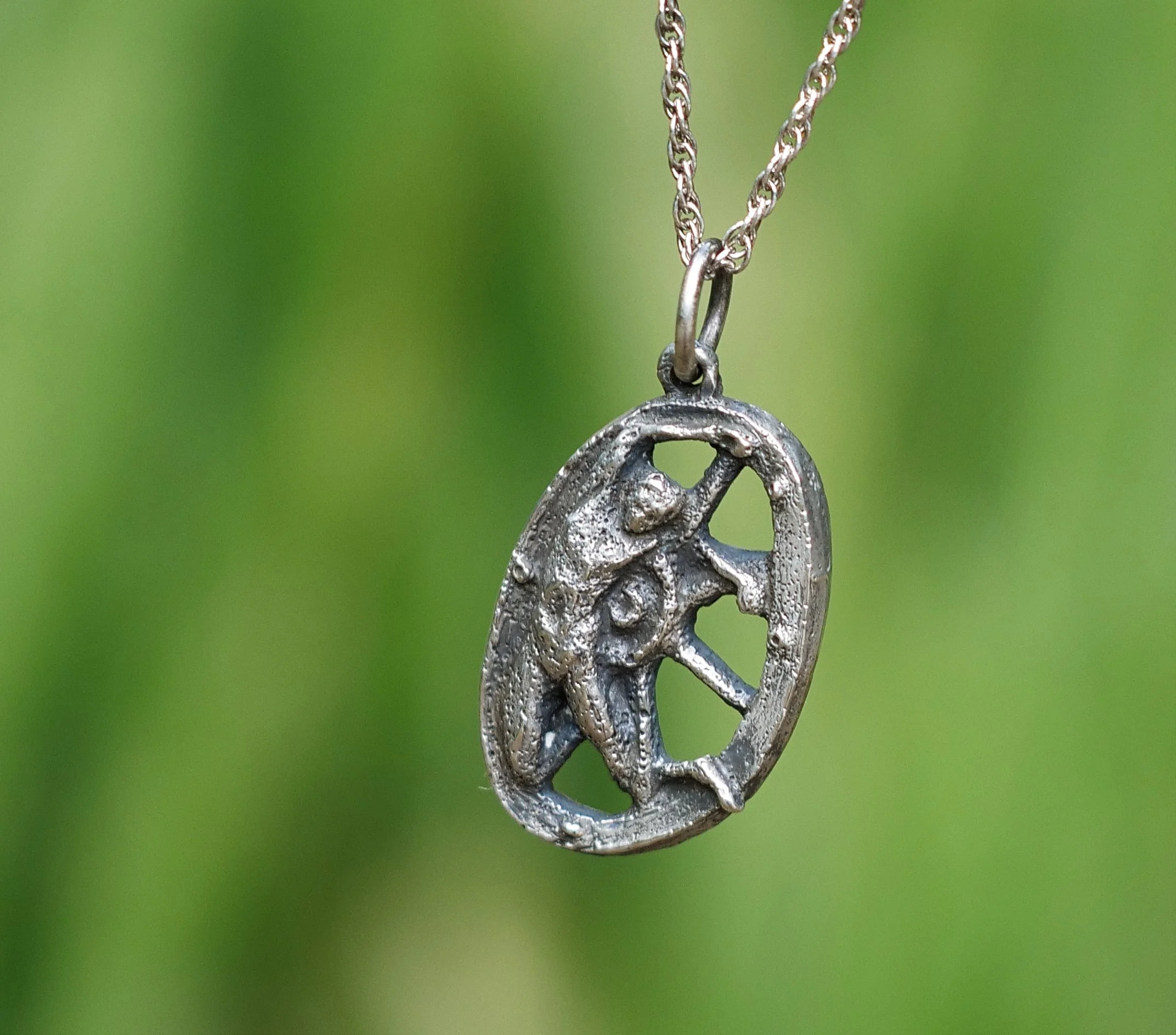 The Breaking Wheel Silver Pendant