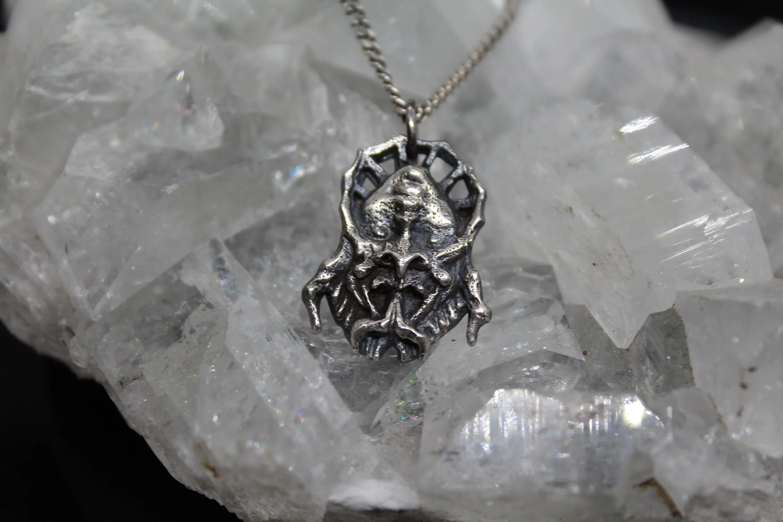 Flip-Face Silver Pendant
