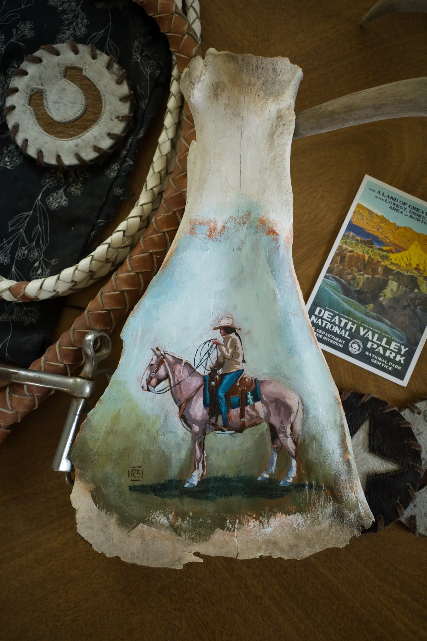 Acrylic paint on cow scapula. Sealed with varnish to make this an heirloom quality piece!