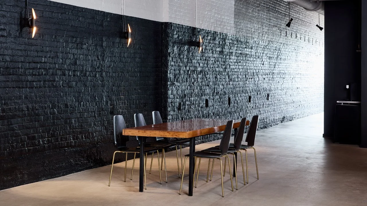 Wooden worktable is one of many textured and beautiful furnishings that create the vibe in our industrial chic studio.