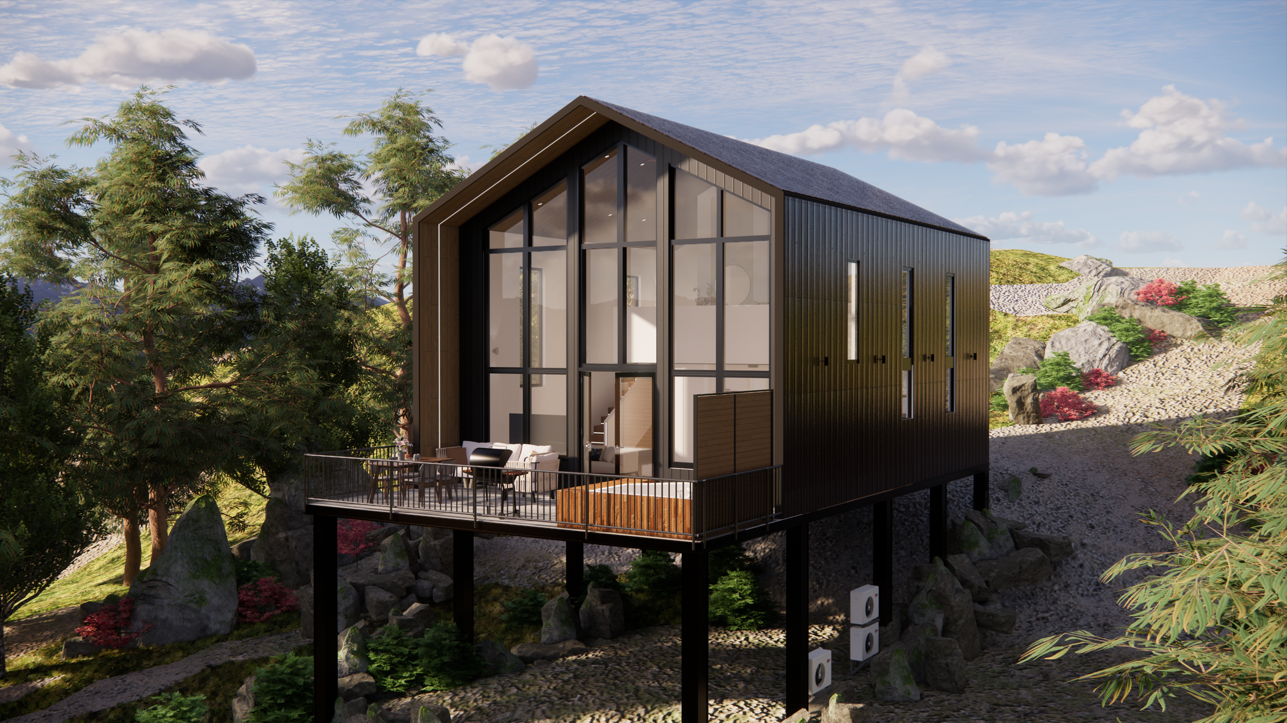 Modern black house on stilts with large glass windows, situated in a rocky, green landscape with trees and shrubs, under a partly cloudy sky.