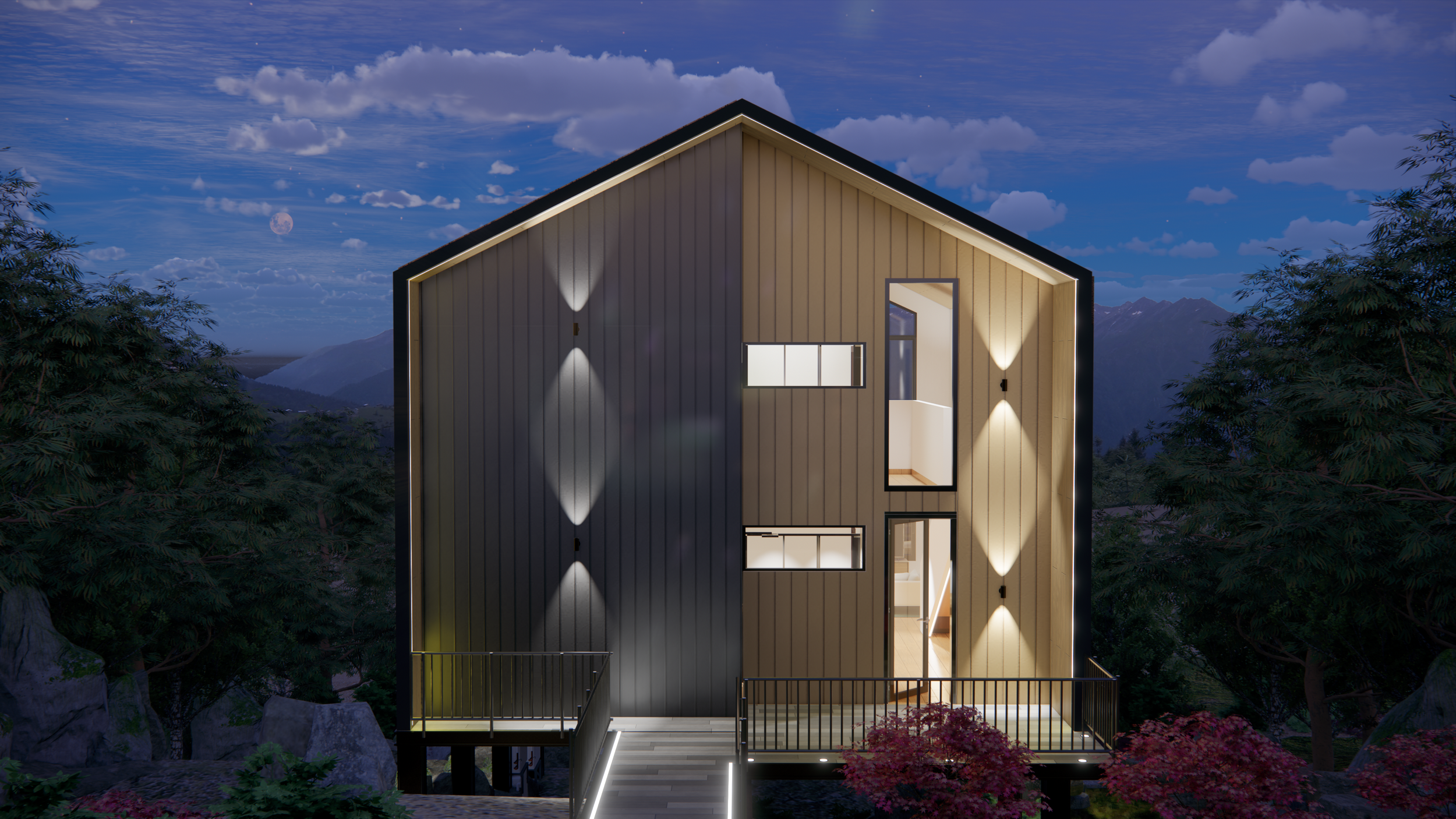 Modern house at night with exterior lights on, surrounded by trees and mountains in the background.