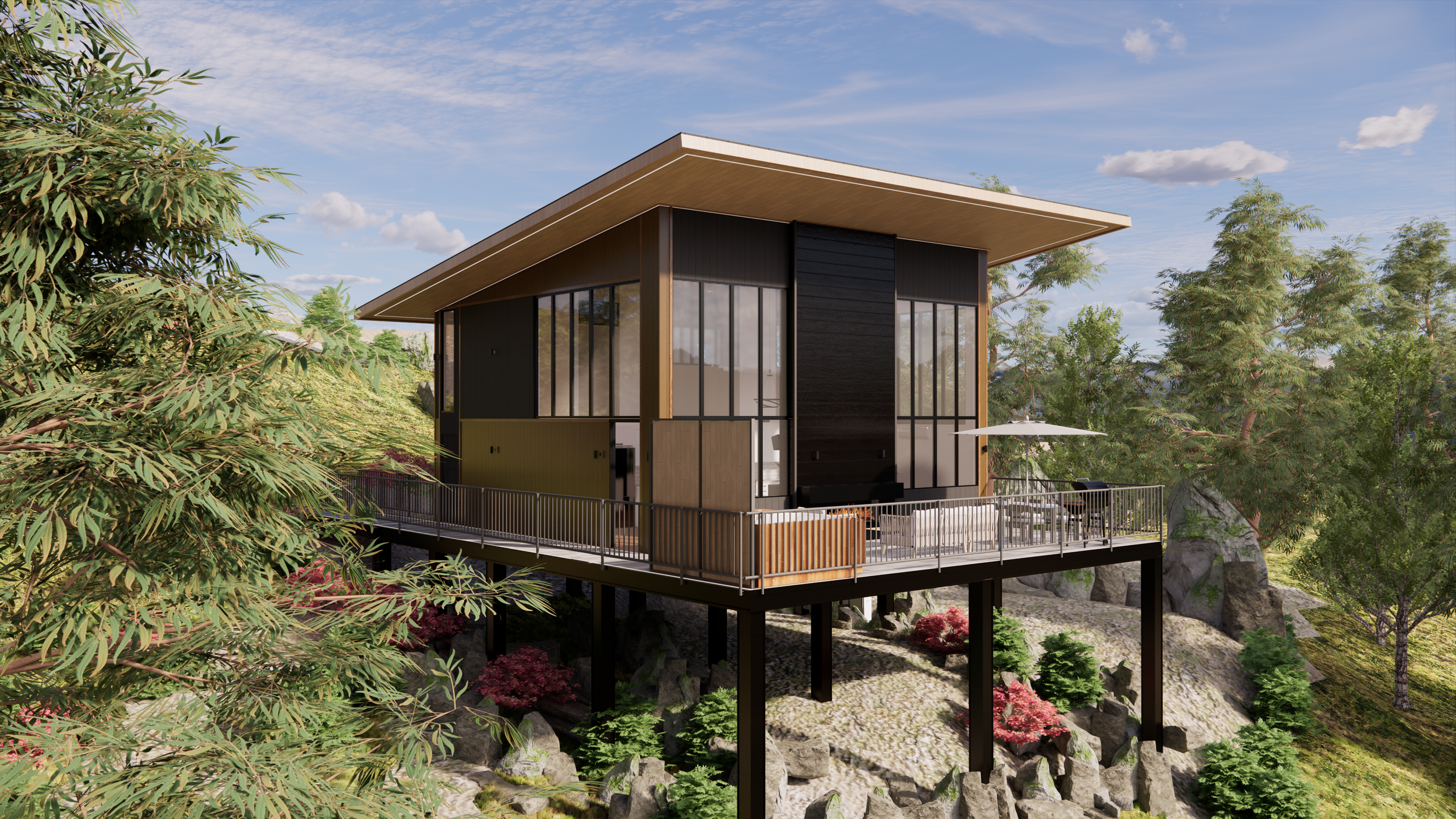 A modern house elevated on stilts surrounded by trees and rocks, with a spacious wraparound deck, large floor-to-ceiling windows, and a sloped roof.