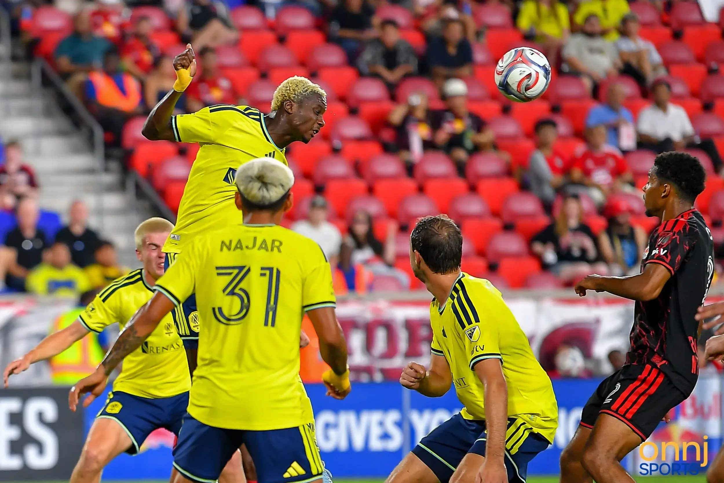 Woledzi headbutts a goal