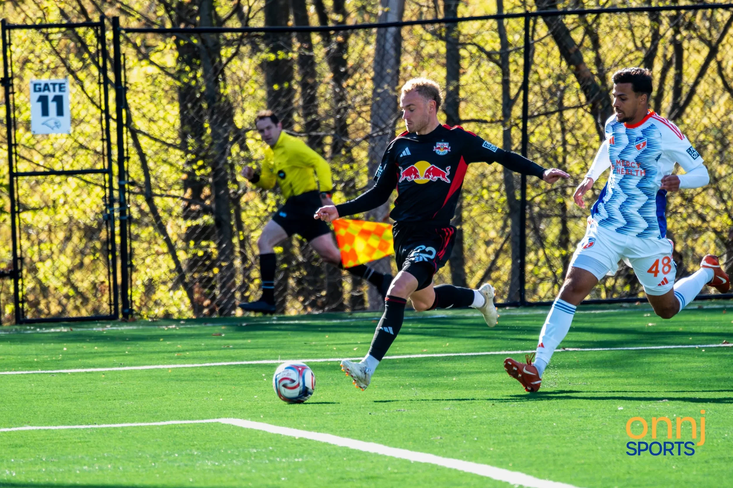 Red Bulls II player kicking the soccer ball
