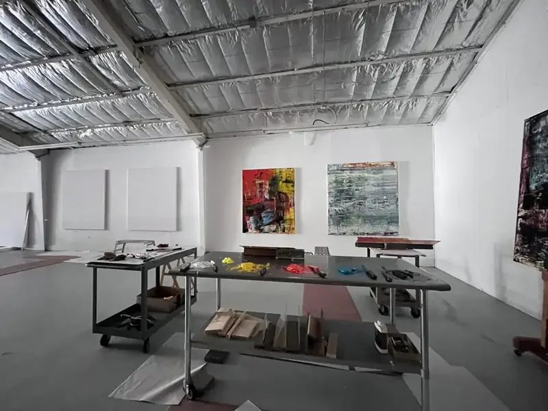 Los Angeles artist studio with worktables prepared for production support