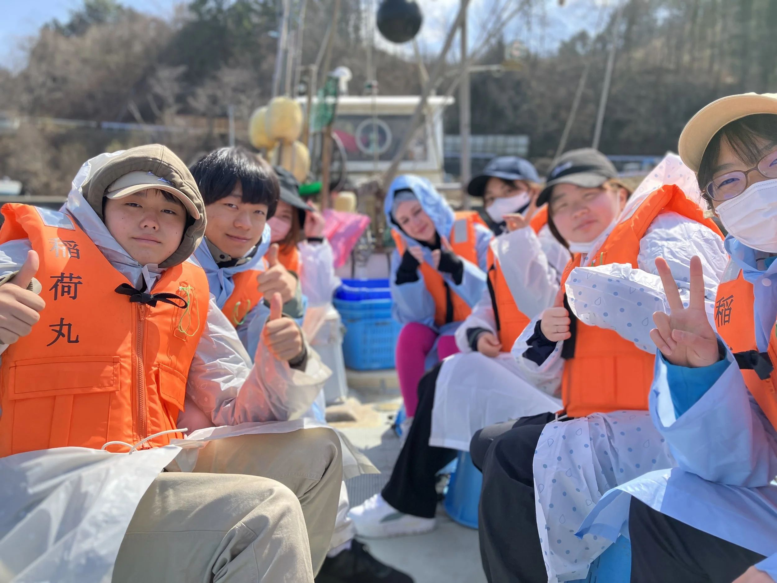 Young people on a boat at summer camp