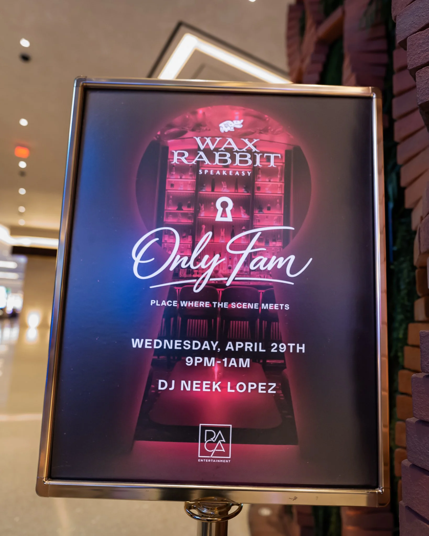 Event poster for an entertainment event called 'Wax Rabbit'. The event features guitar, a DJ named Neek Lopez, and is scheduled for Wednesday, April 29th from 9 PM to 1 AM. The poster has a dark background with pink and purple highlights, with the te