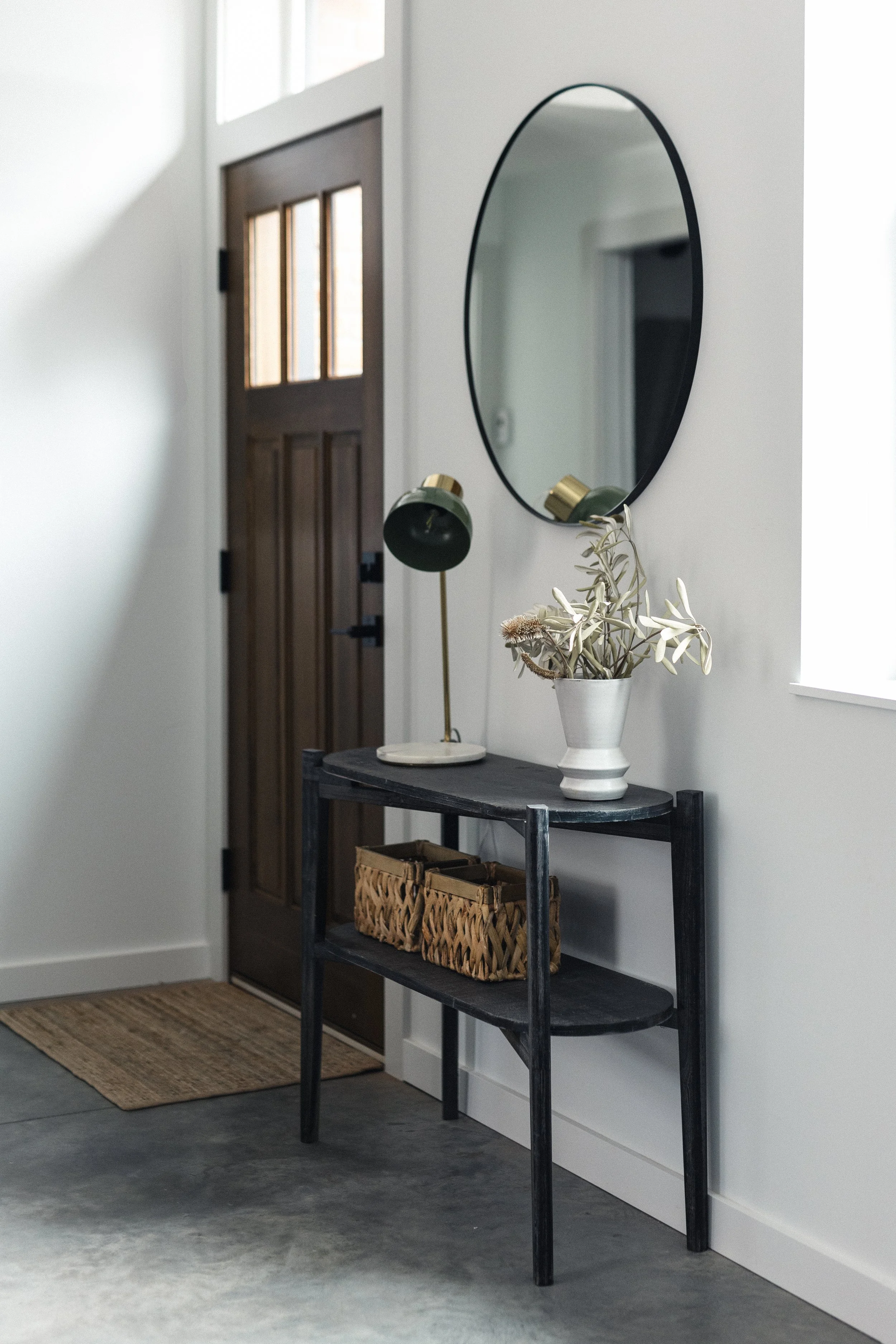 Entryway leads into an open concept space, this ground level condo has a private entrance, off street parking and fenced for your dog and heated concrete floors. 