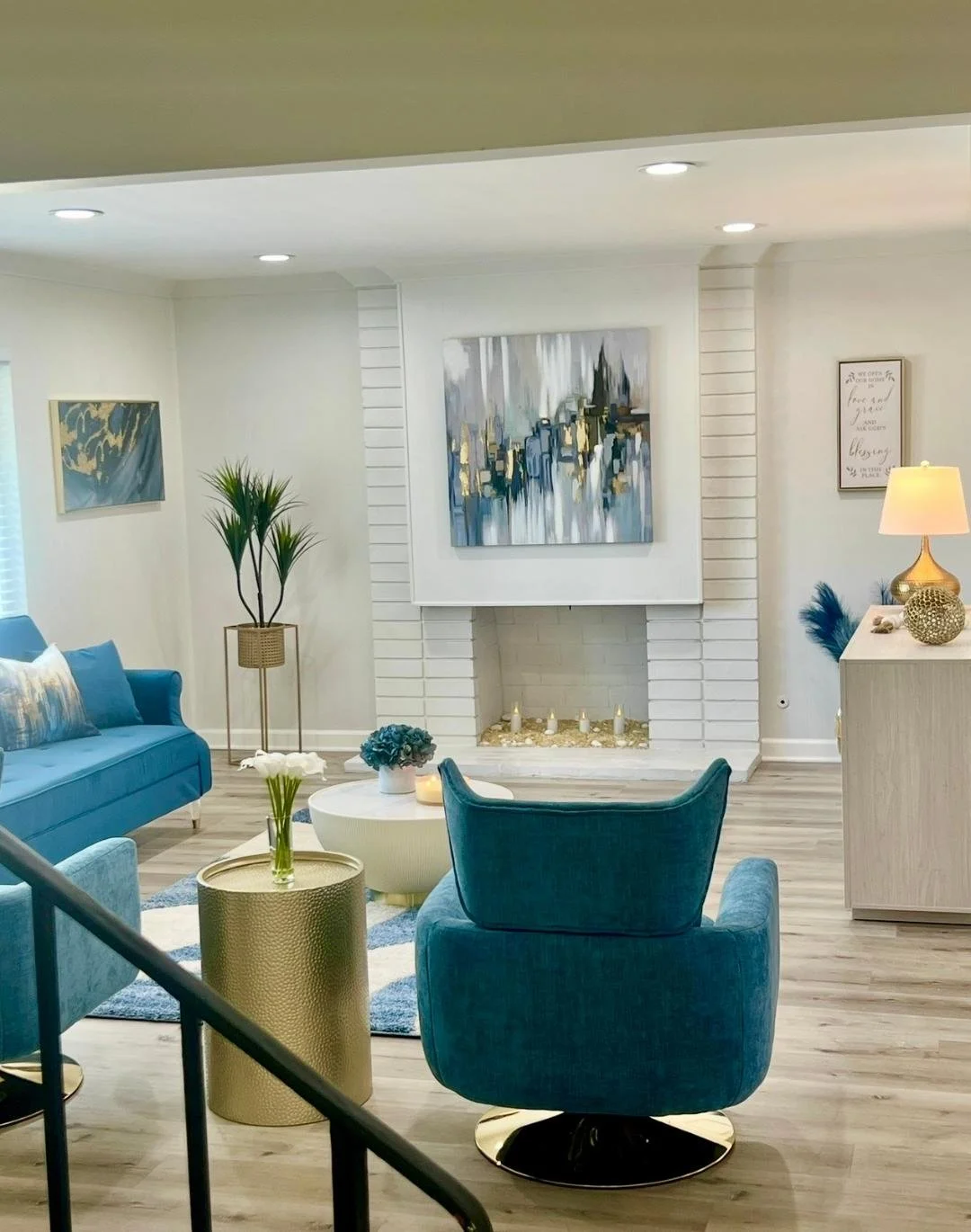 "An elegant living room designed with layered textures, warm tones, and curated decor to create a refined yet welcoming atmosphere."