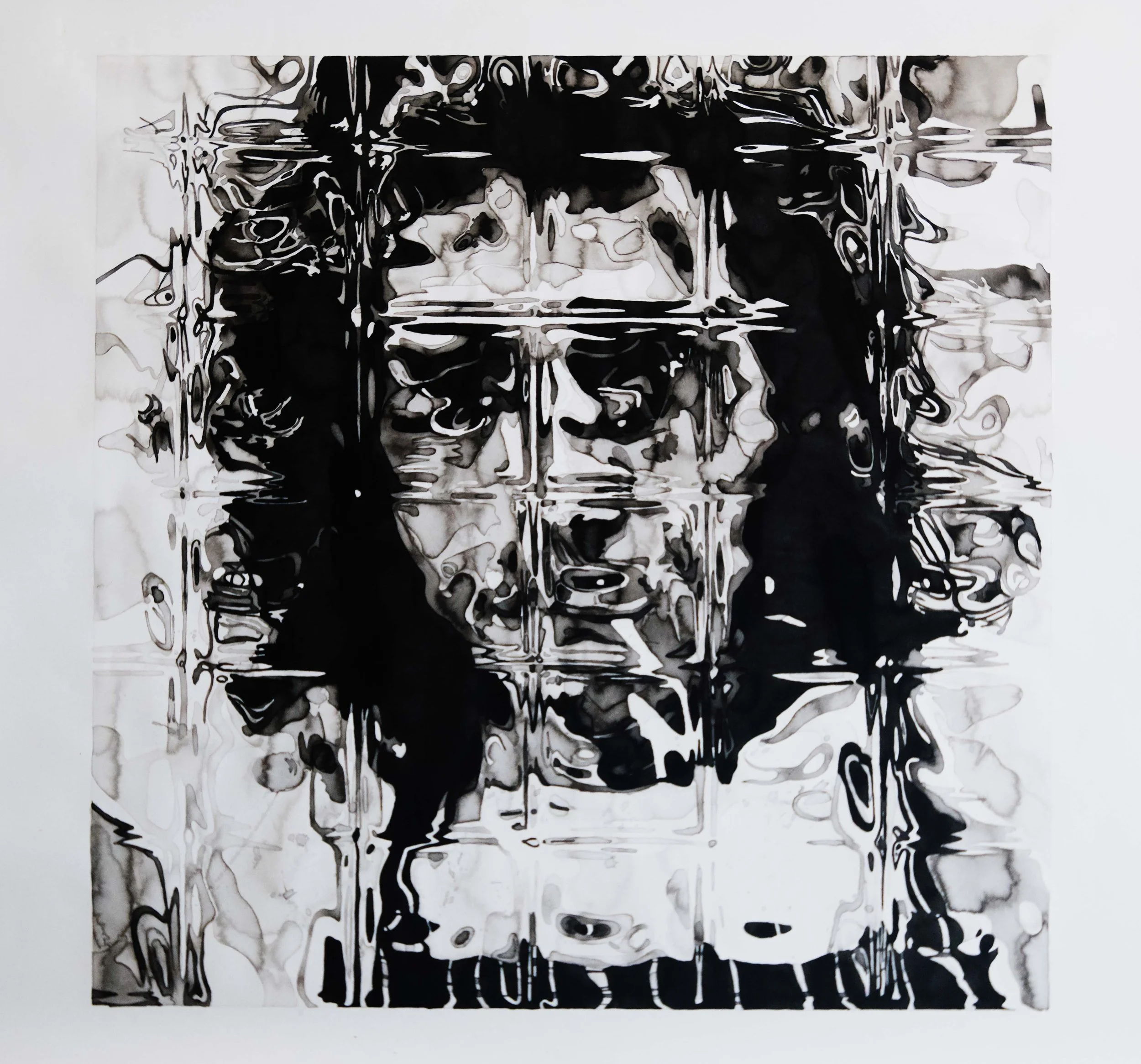 Abstract black and white ink art with fluid, swirling patterns and irregular shapes creating a dynamic composition.