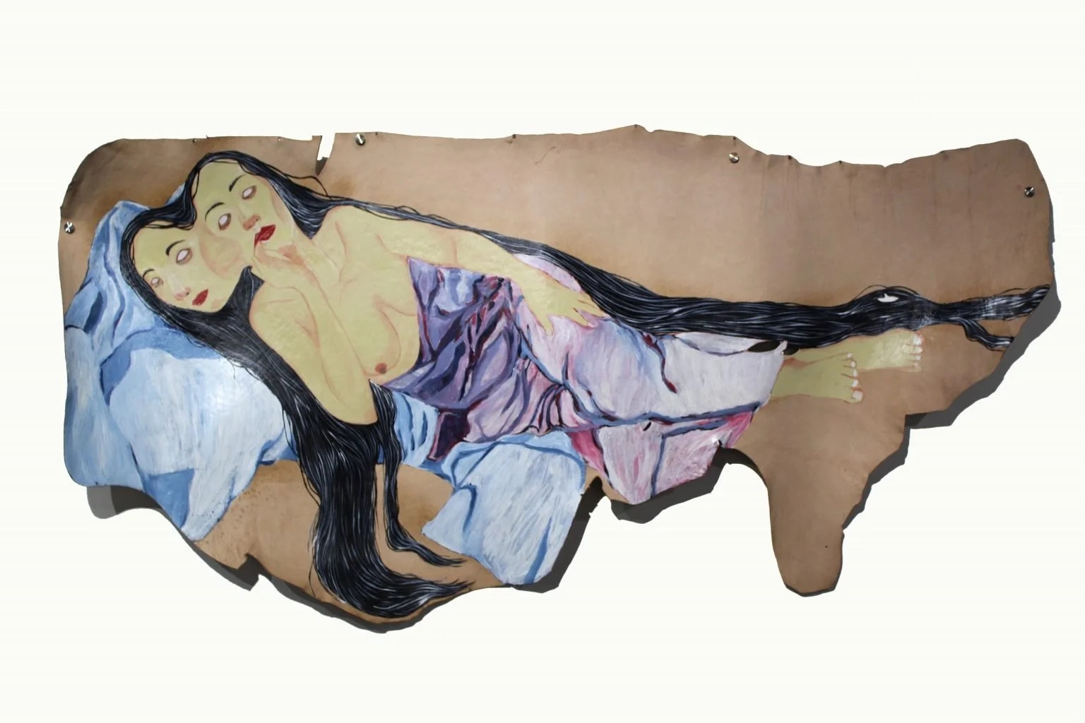 A mixed media artwork on a torn piece of paper depicts a reclining nude woman with long black hair, resting on a blue pillow, with her hand on her lips and a contemplative expression.