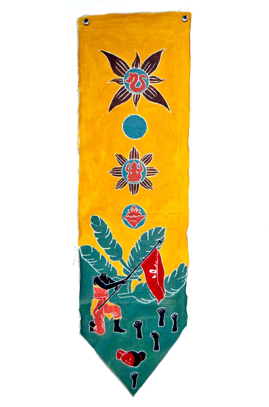 Colorful fabric banner featuring a figure holding a spear, various symbolic elements, and vibrant floral and abstract designs on a yellow and green background.