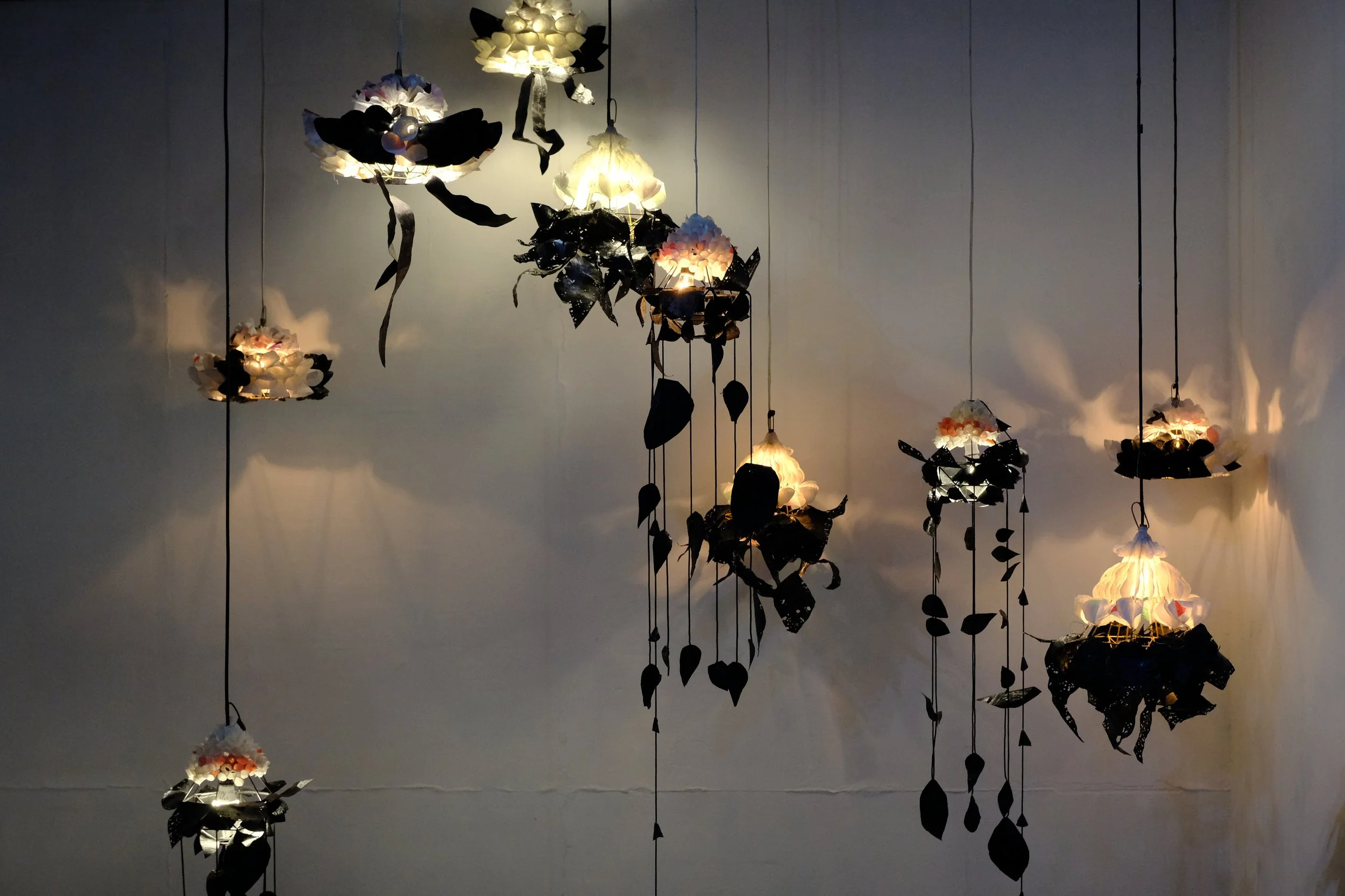  Kayun Kalamangsa #2 
 Upcycled plastic bag, yarn and wire, lightbulbs 
 Variable dimensions, 2022 