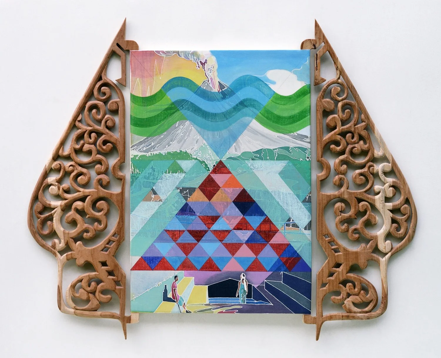 Colorful artwork with mountains, a volcano emitting smoke, and a geometric pattern, framed by ornate wooden filigree pieces.