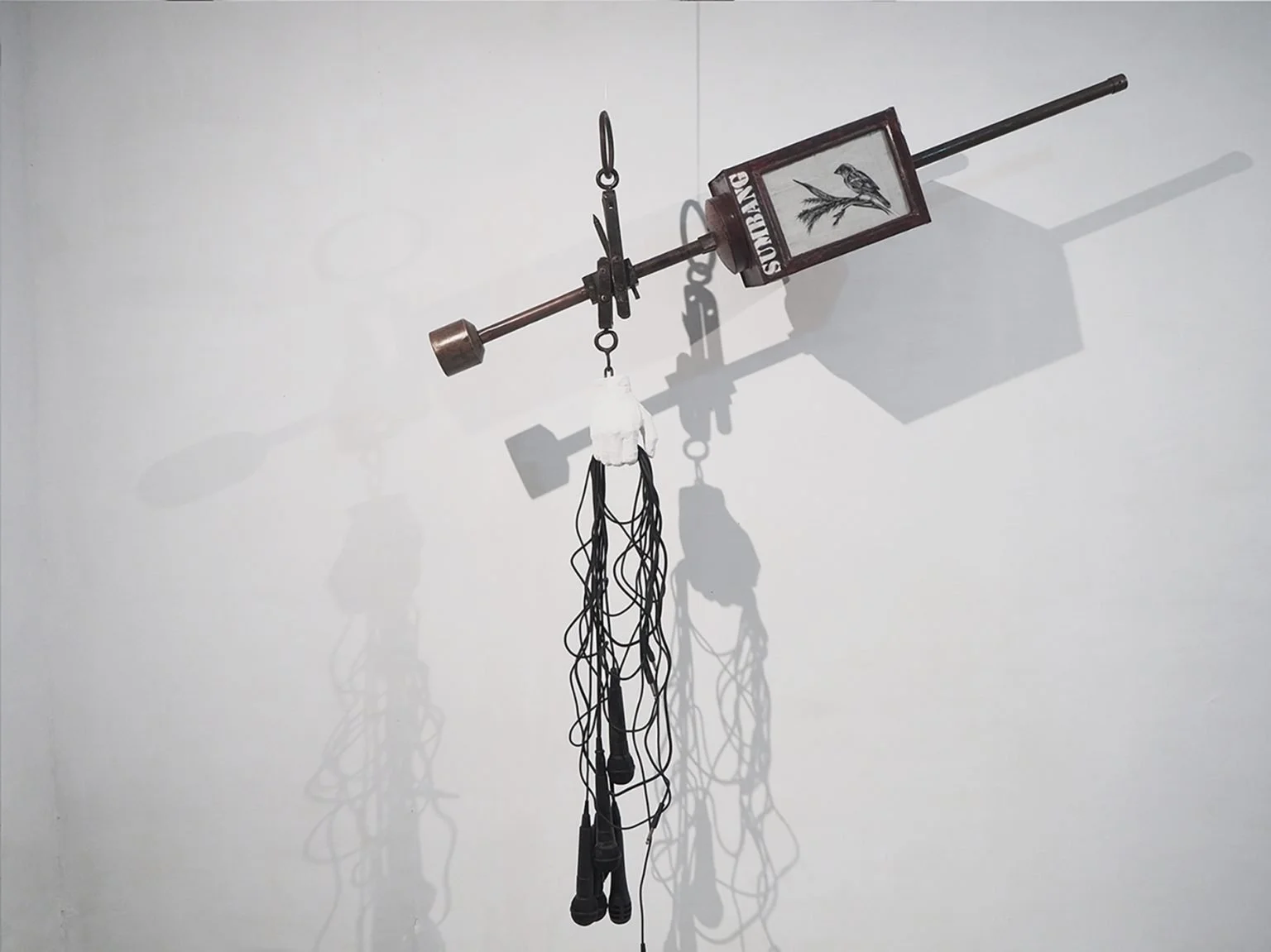 moch-krismon-ariwijaya_timbangan-berimbang-balanced-scale_microphones-wires-cracker-box-canvas-scales-and-gypsum_180-x-8.jpg