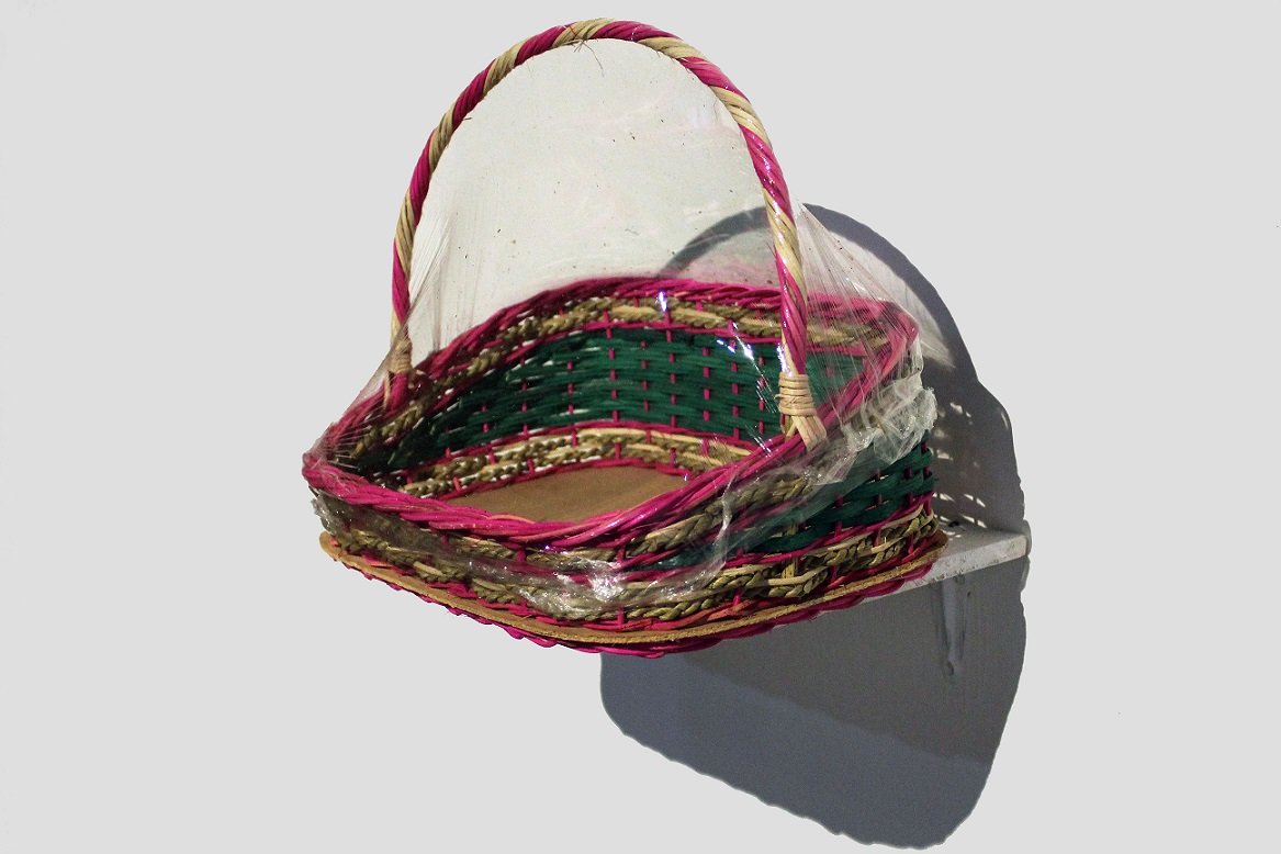  Good Intention I 
 Fruit basket, cling wrap, tape 
 33 cm x 39 cm x 29 cm, 2018 