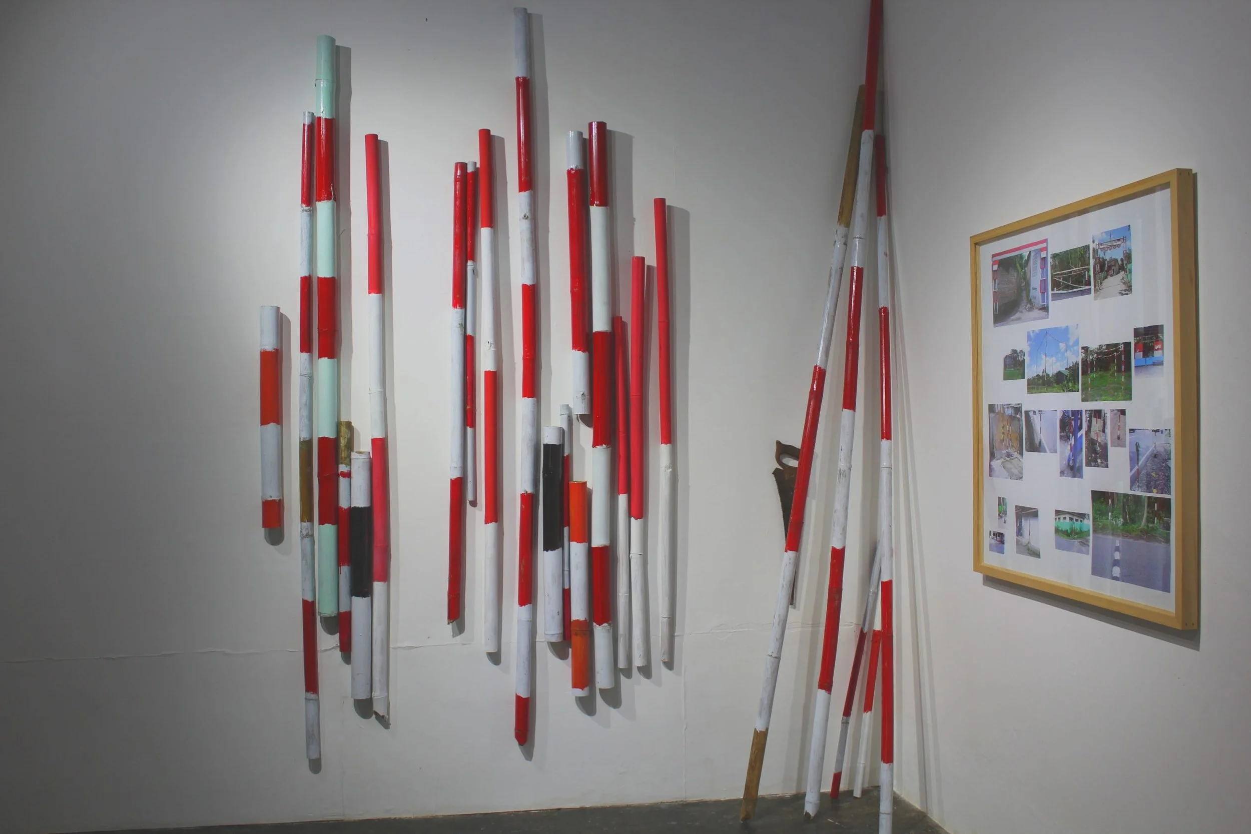  Stolen Poles 
 Enamel and acrylic on bamboo | Inkjet on archival paper 
 Variable dimension | 100 cm x 100 cm, 2018 
