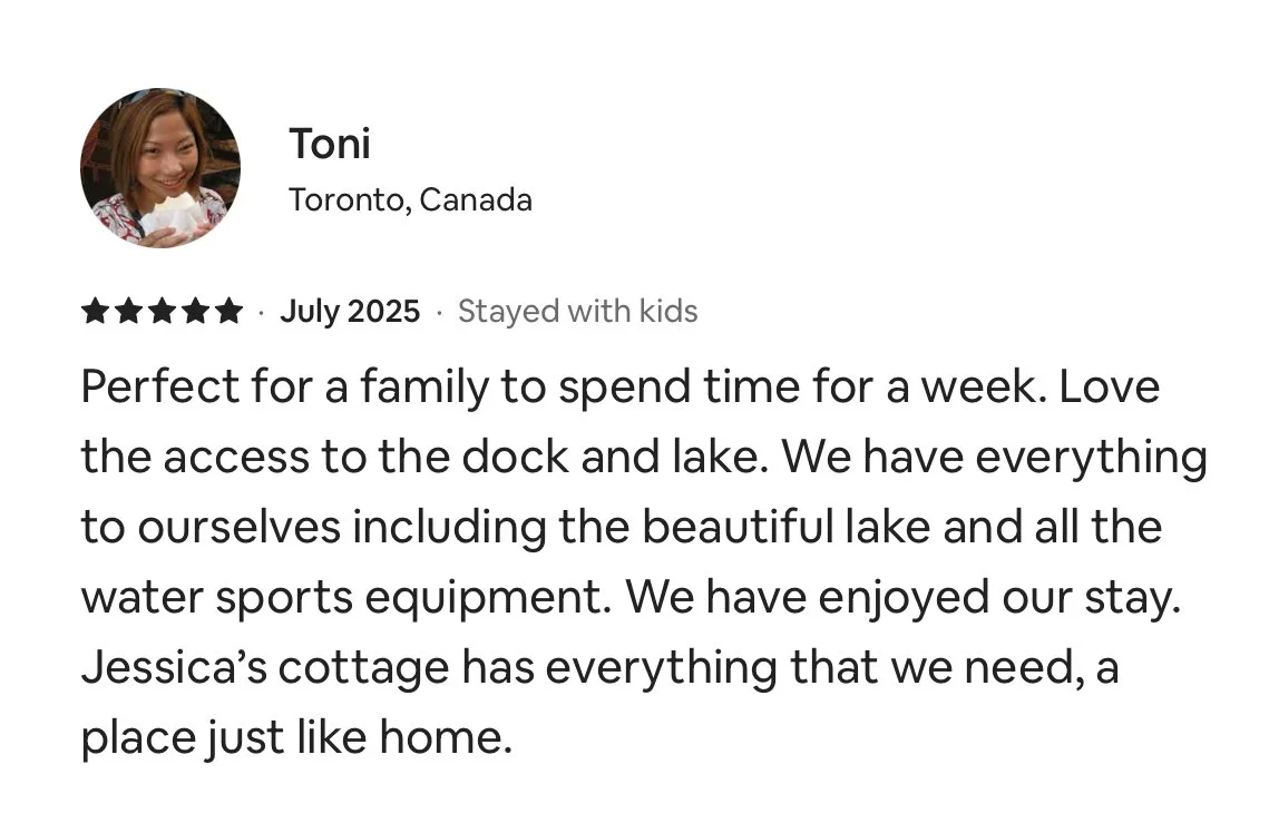 Review for a family vacation rental in Toronto, Canada, mentioning access to a dock and lake, water sports equipment, and a cozy cottage.