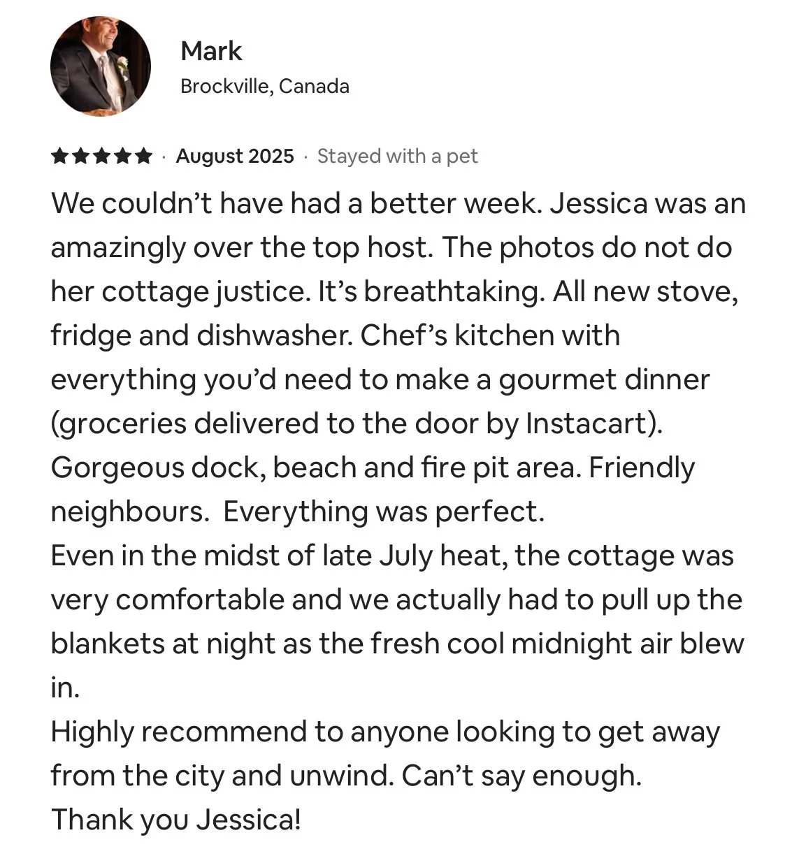 Online review of a stay at a cottage in Brockville, Canada, featuring a photo of a man in a suit, with text describing a positive experience, a well-equipped kitchen, and a dock with beach and fire pit.
