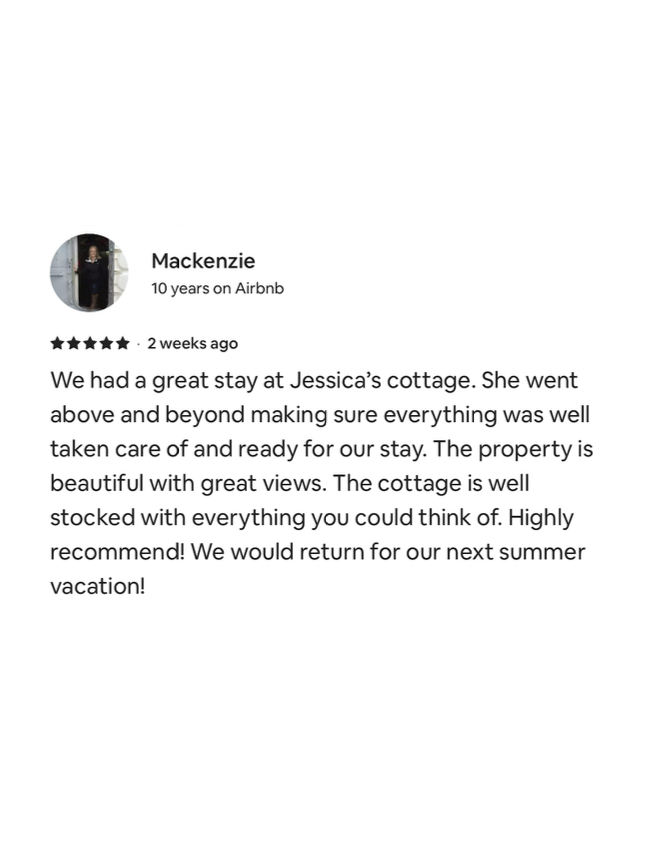 Review from Mackenzie about a stay at Jessica's cottage, praising the property’s views, well-stocked amenities, and her intention to return.